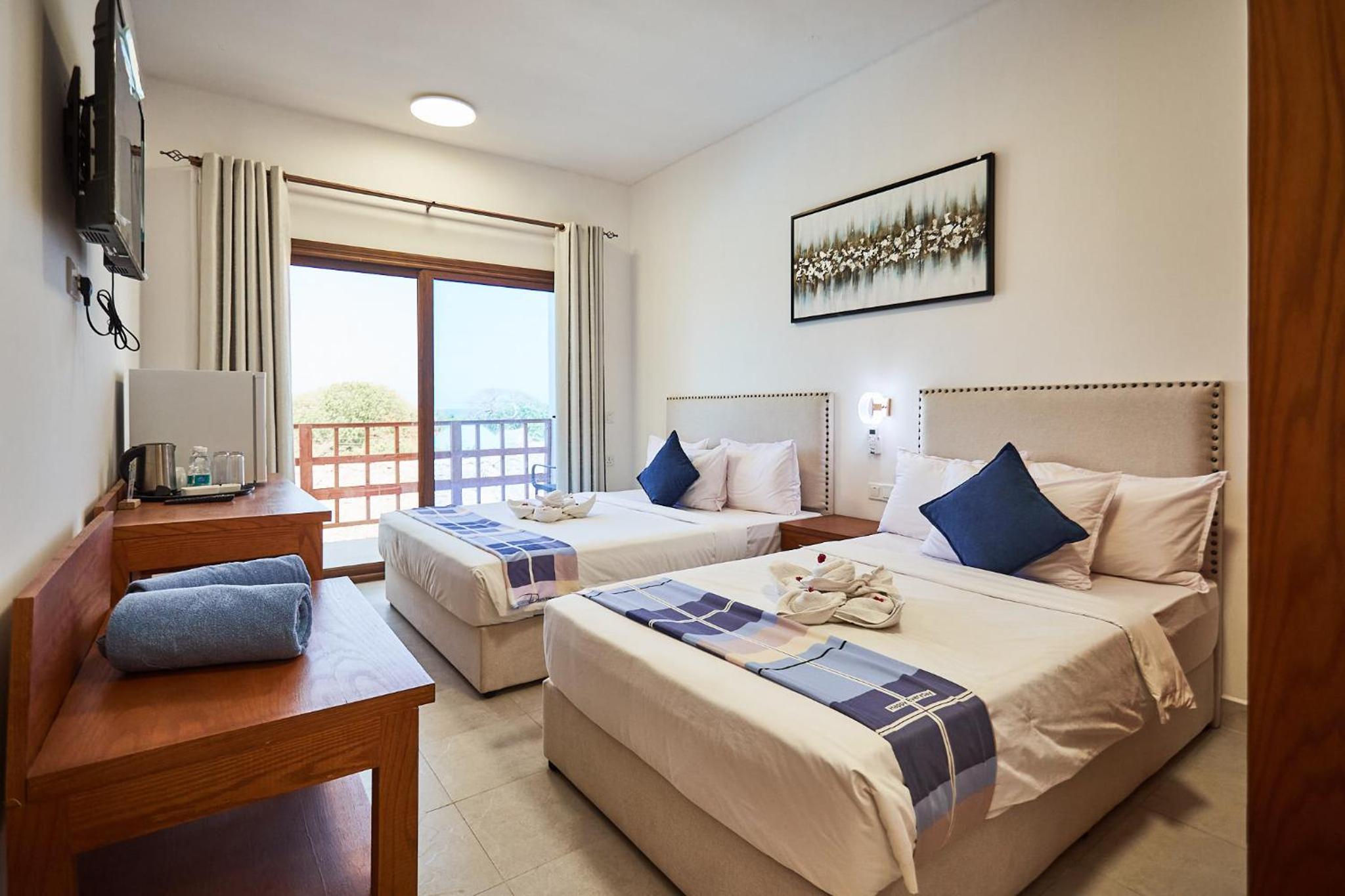 Deluxe Triple Room with Sea View