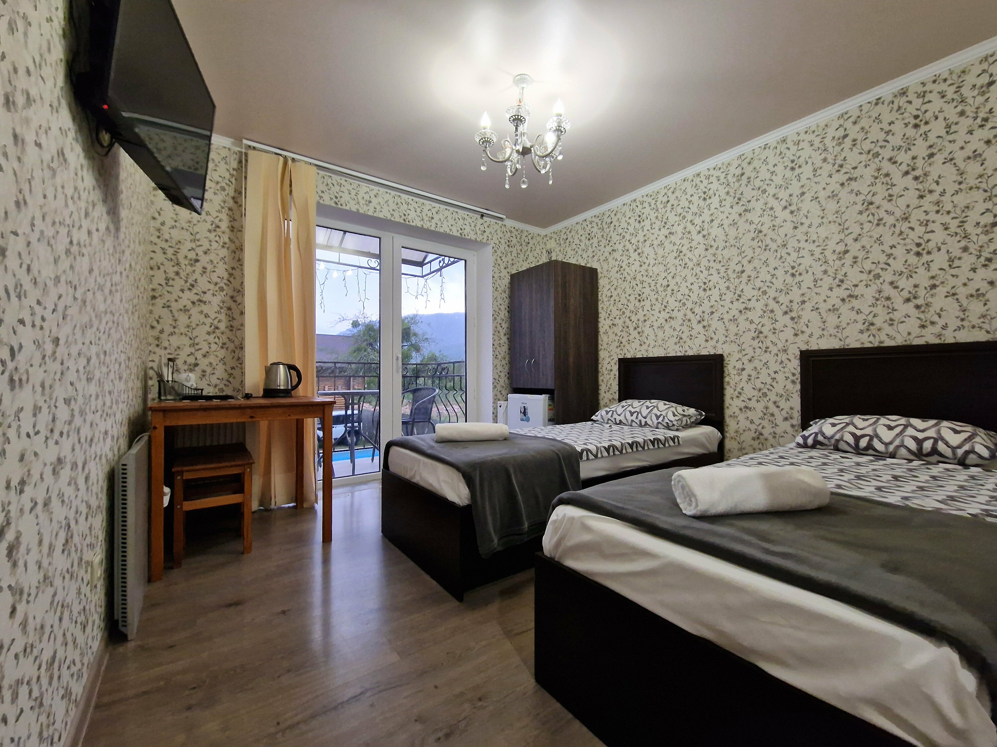 Двухместный номер с 2 отдельными кроватями и балконом