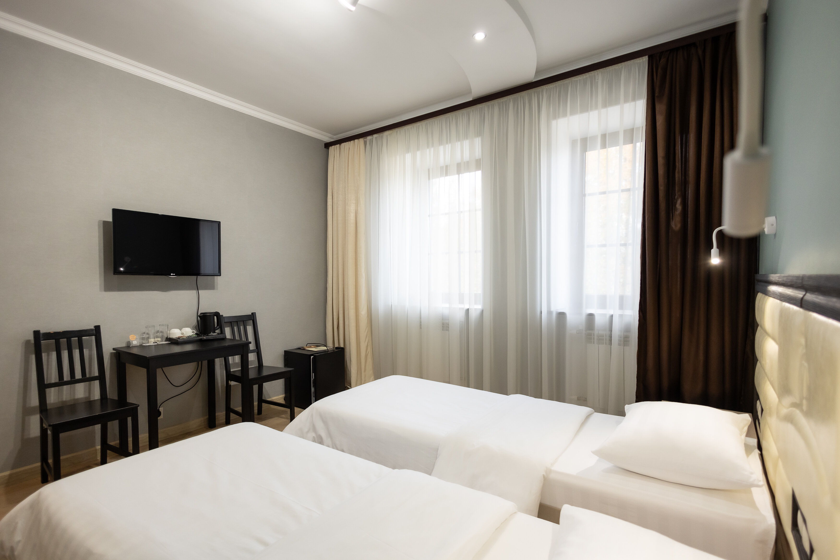 Просторный двухместный номер с 2 отдельными кроватями