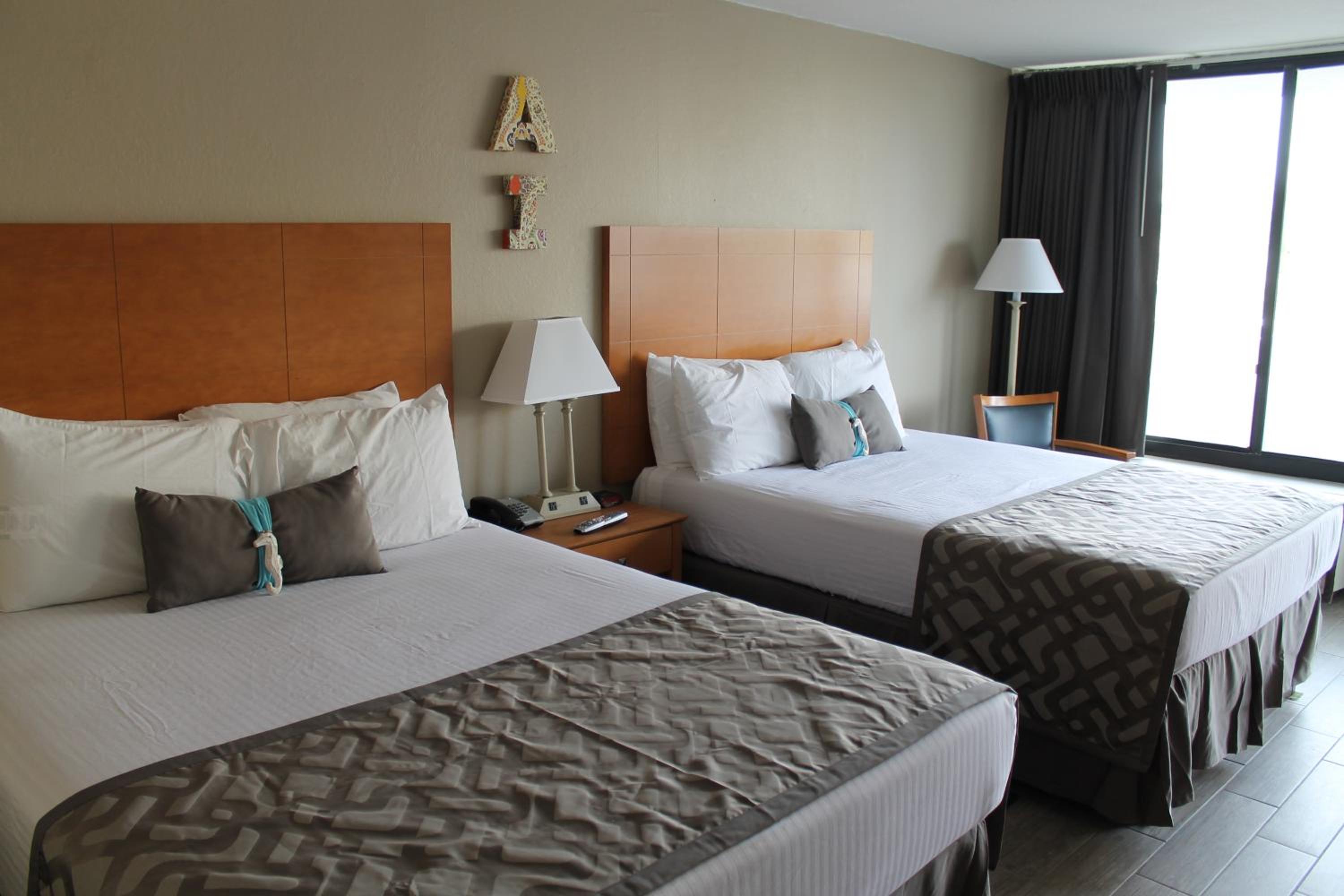 Deluxe Queen Room with Two Queen Beds "Near Ocean" 