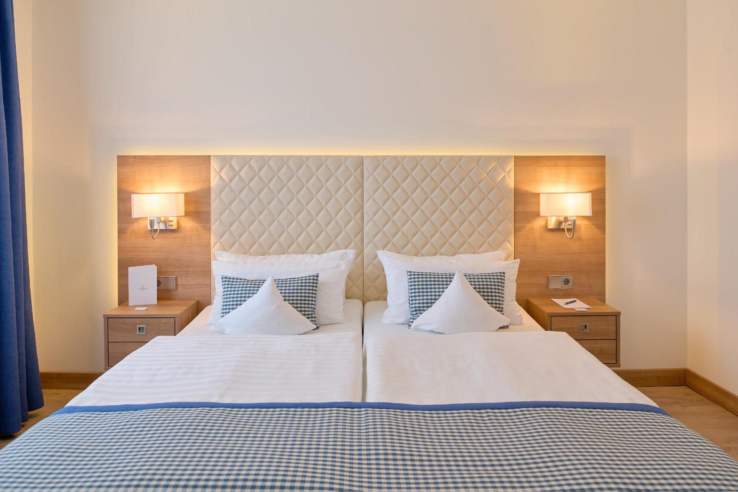 Suite with Balcony and Side View of the Sea