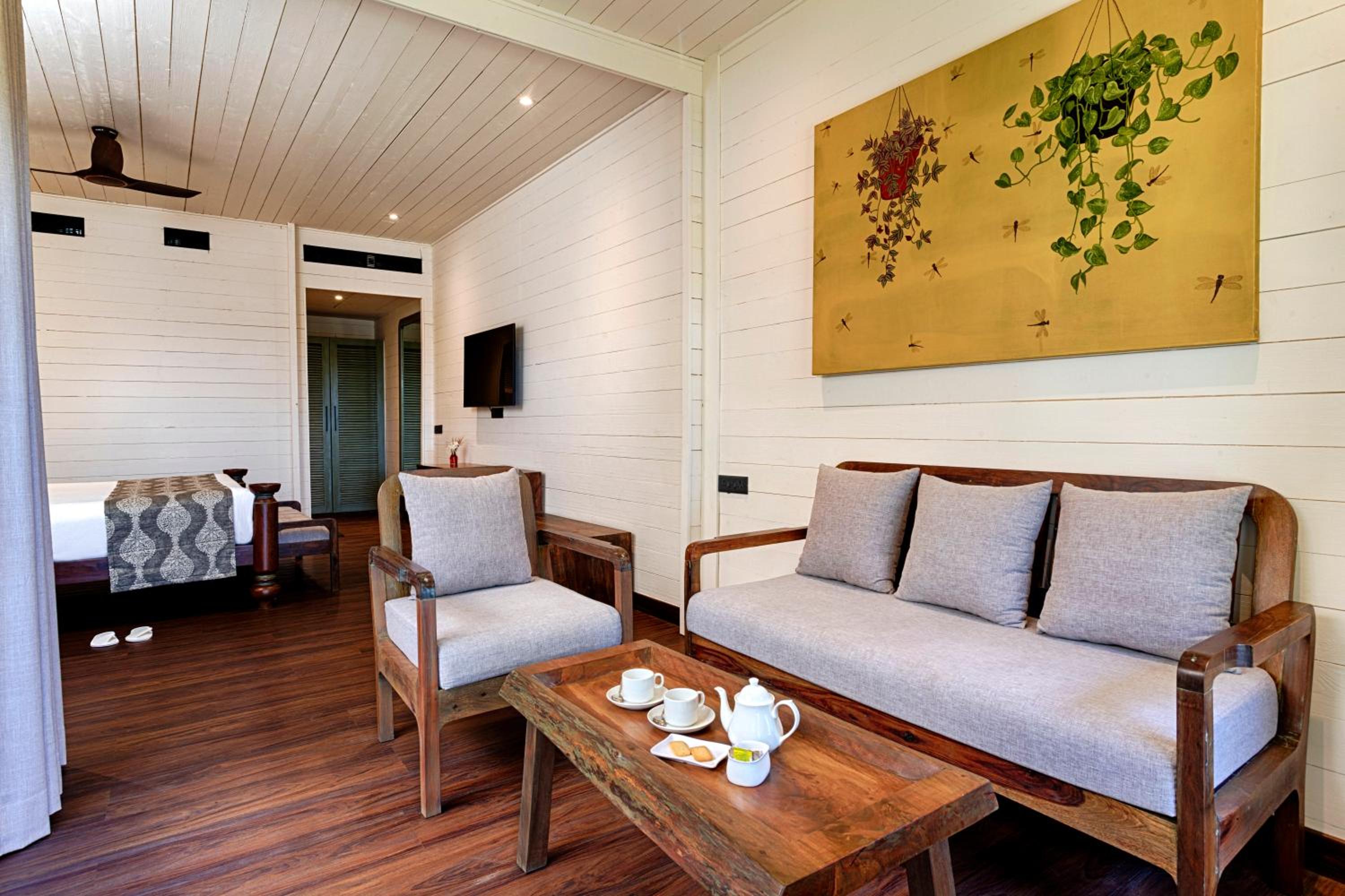 Premium River View Cottage with Balcony (with complimentary Kayaking and 20% off on Massage session)