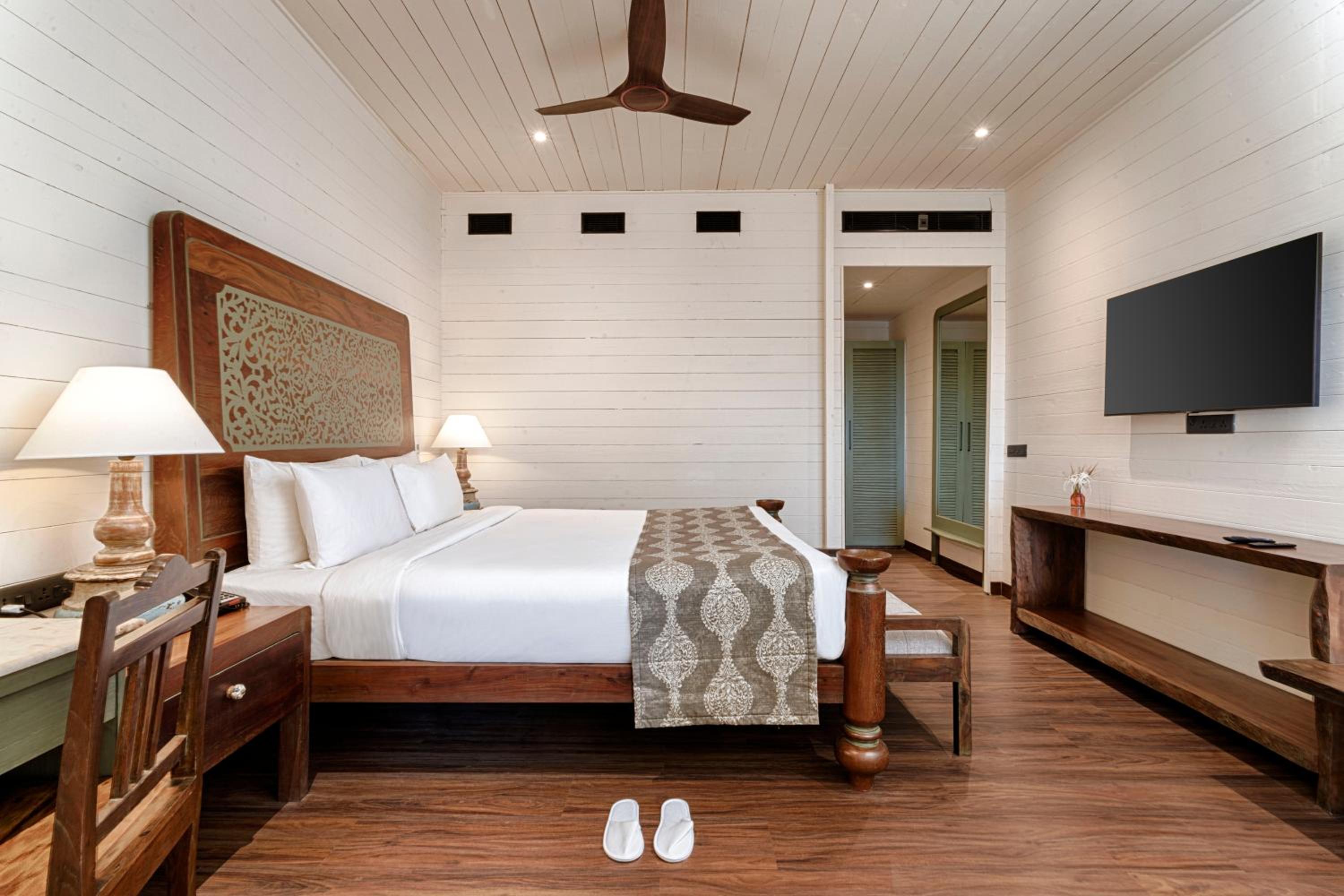 Premium River View Cottage with Balcony (with complimentary Kayaking and 20% off on Massage session)