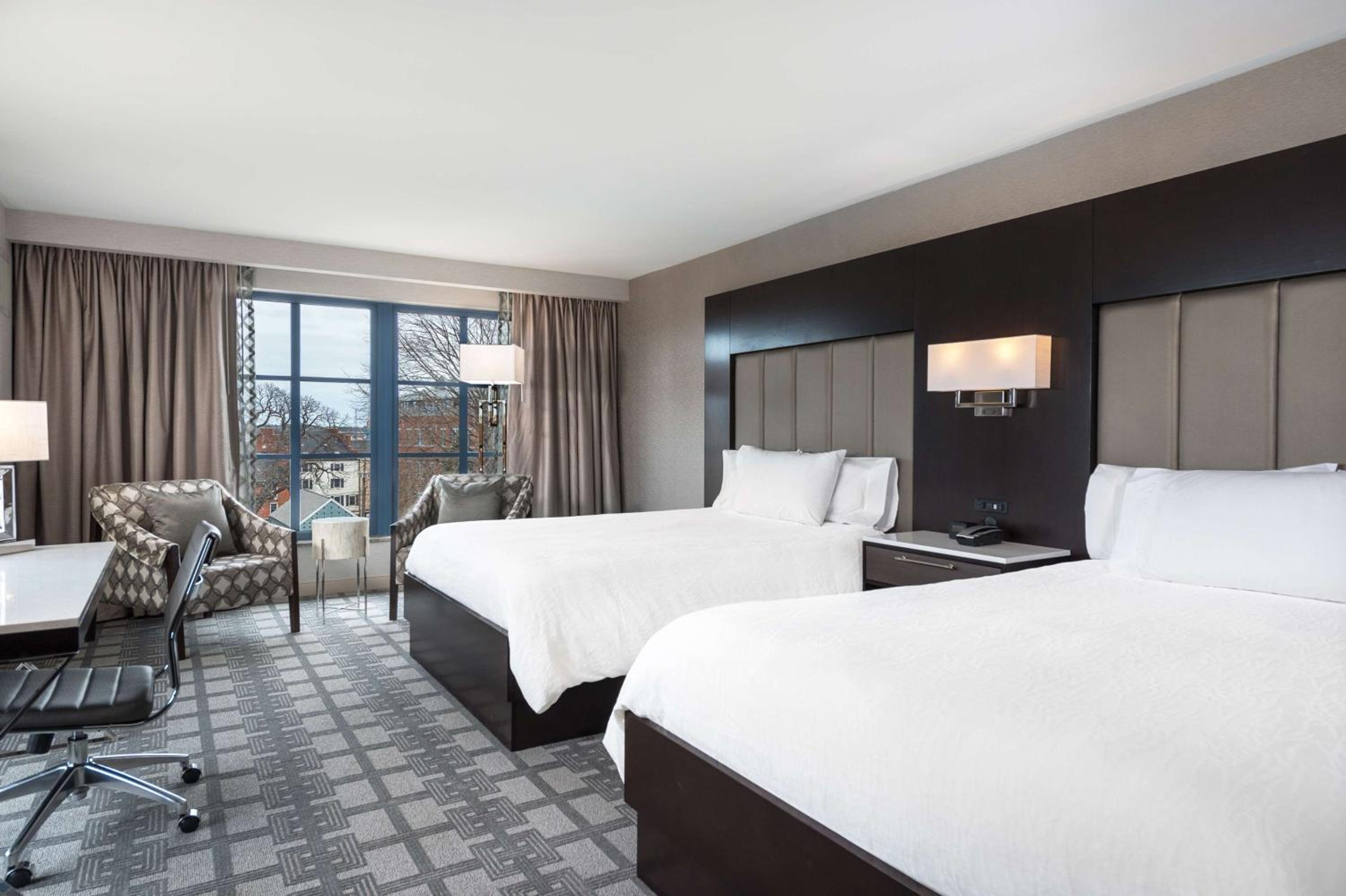 Corner Queen Room with Two Queen Beds and Fridge