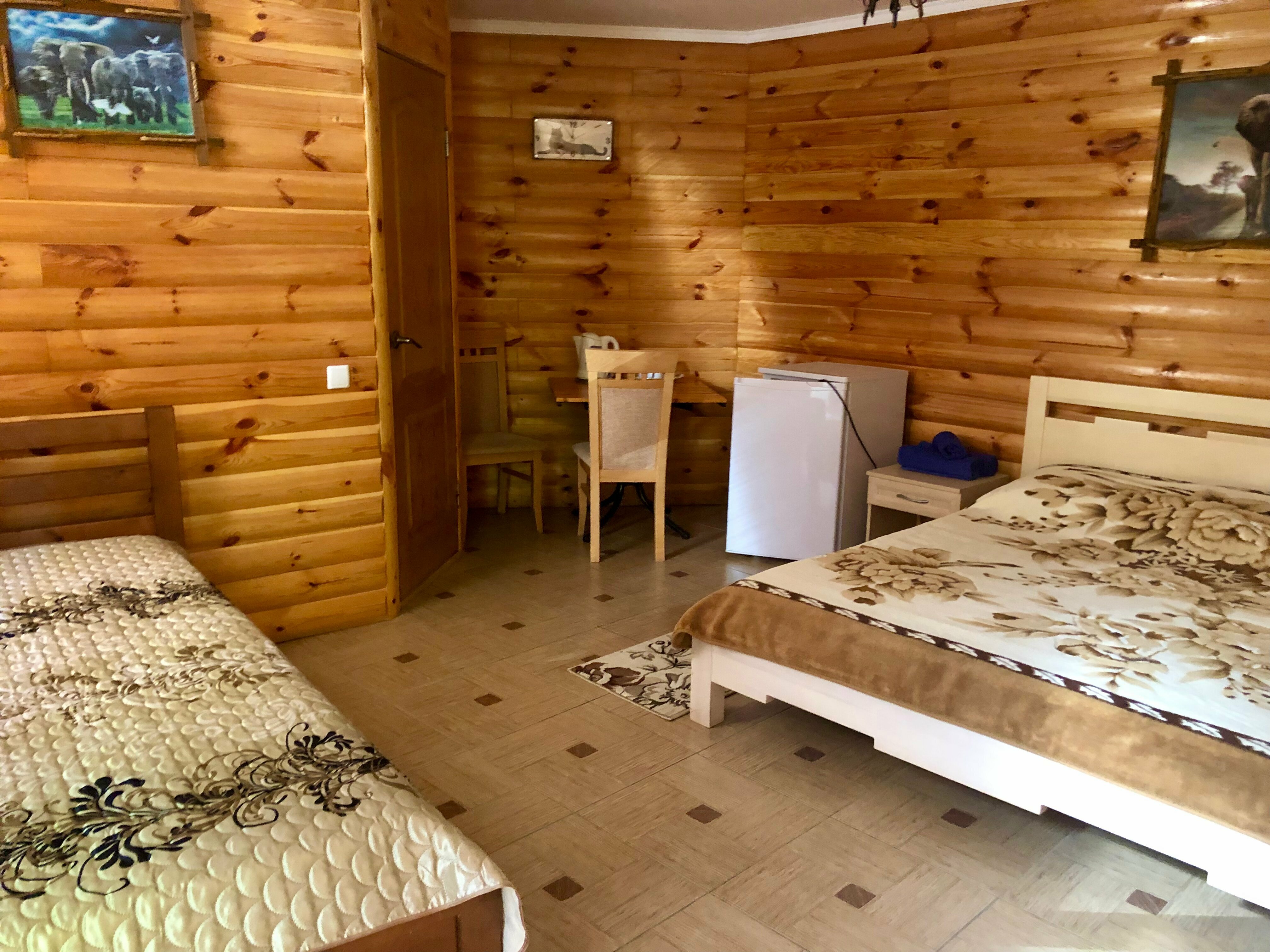 Улучшенный однокомнатный номер с двухспальной кроватью на 1 этаже