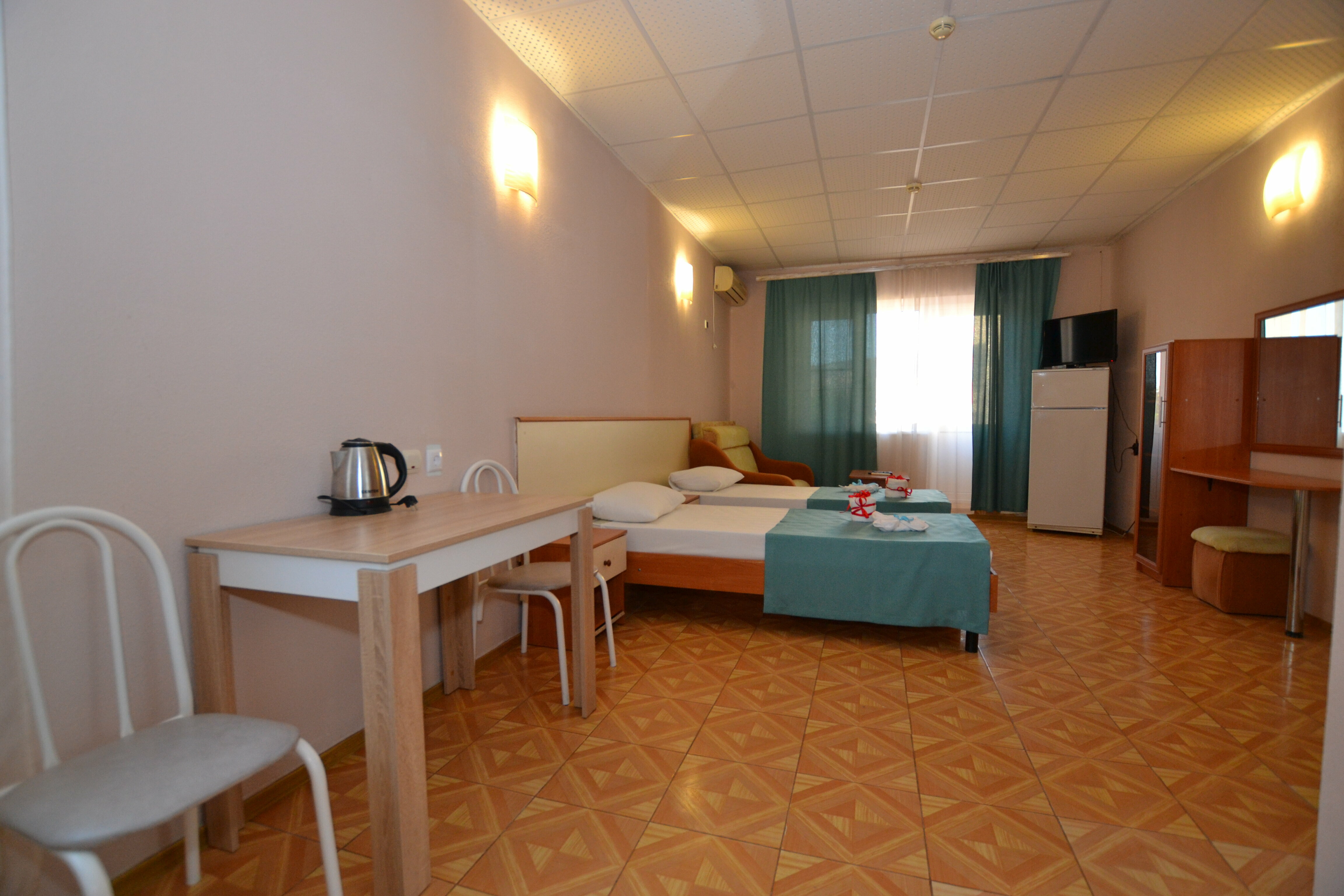 Трехместный номер с балконом