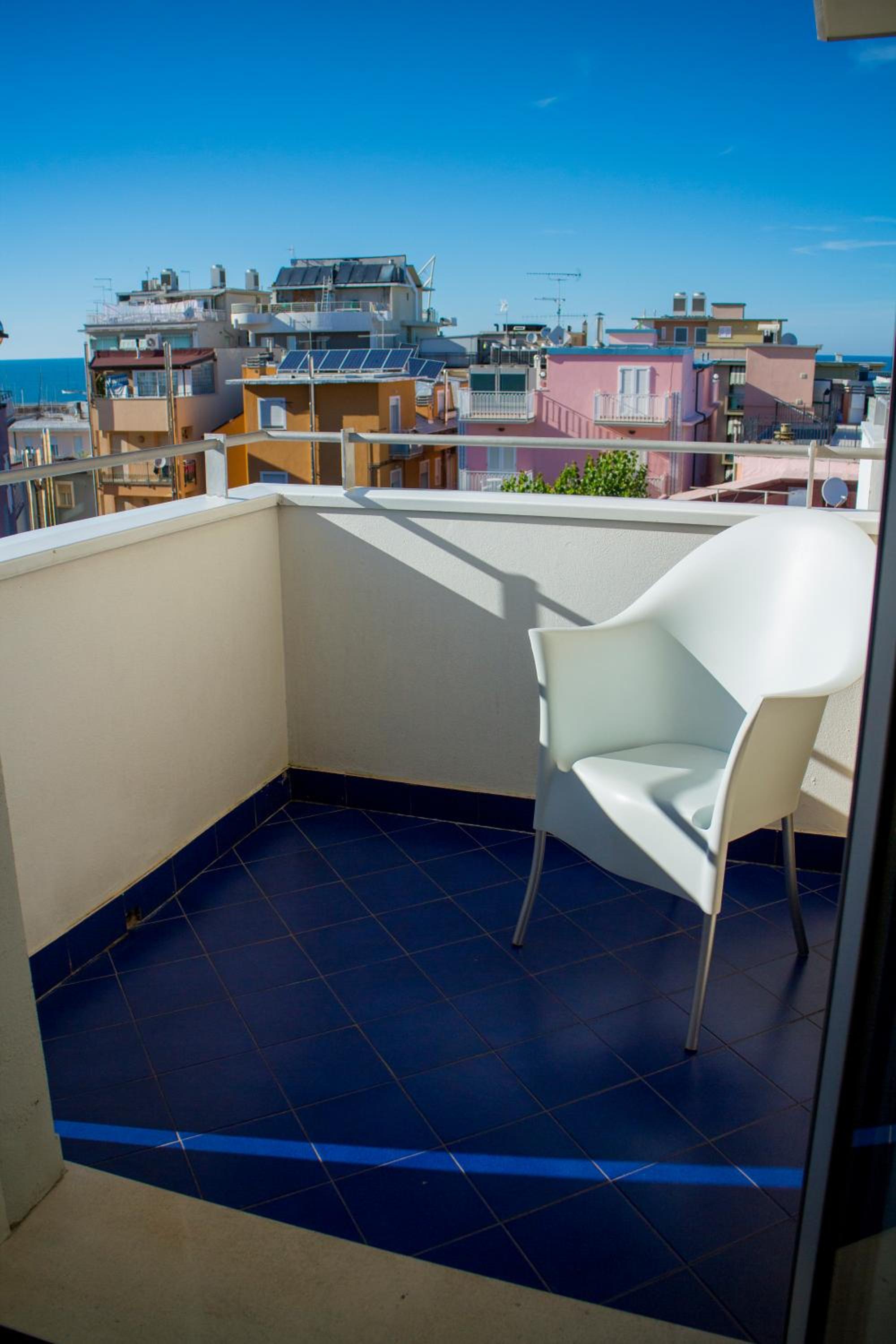 One-Bedroom Apartment with Balcony and Lateral Sea View