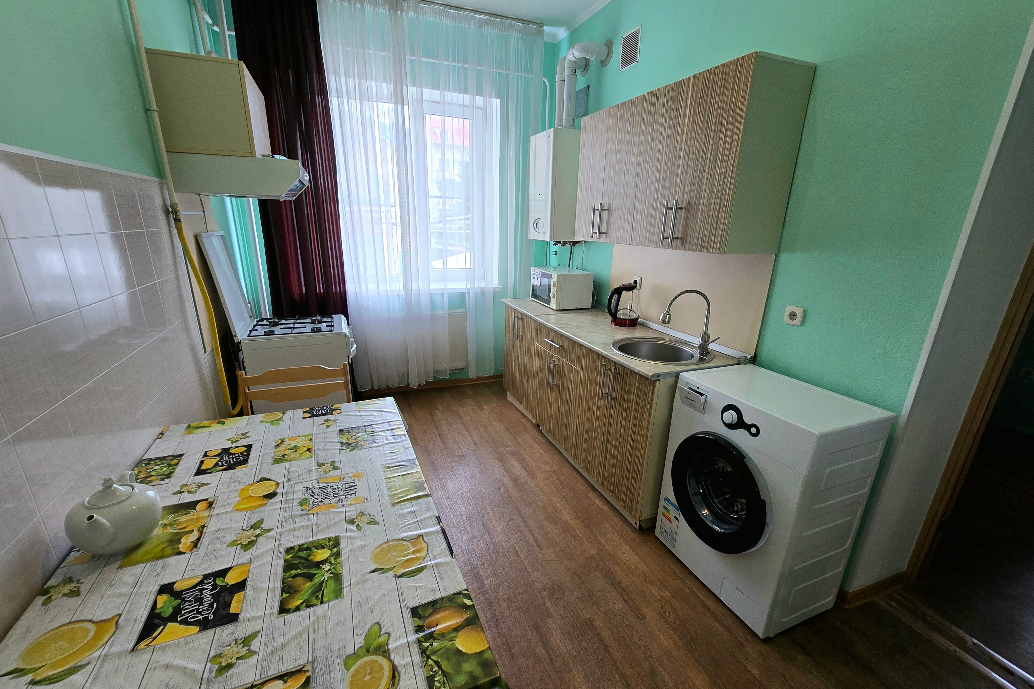 Номер с кухней и стиральной машиной без балкона