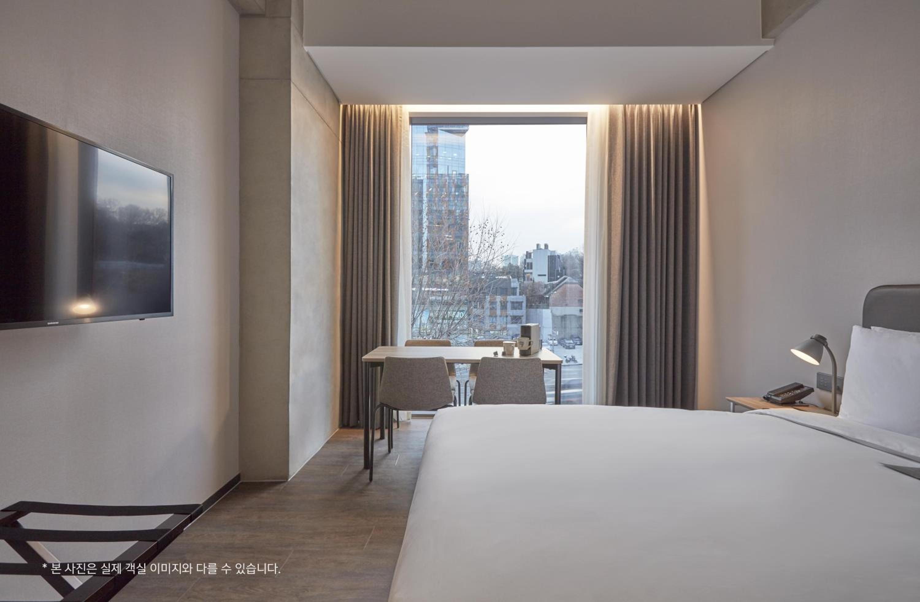 Deluxe Double Wood Flooring room - Located at 3rd floor