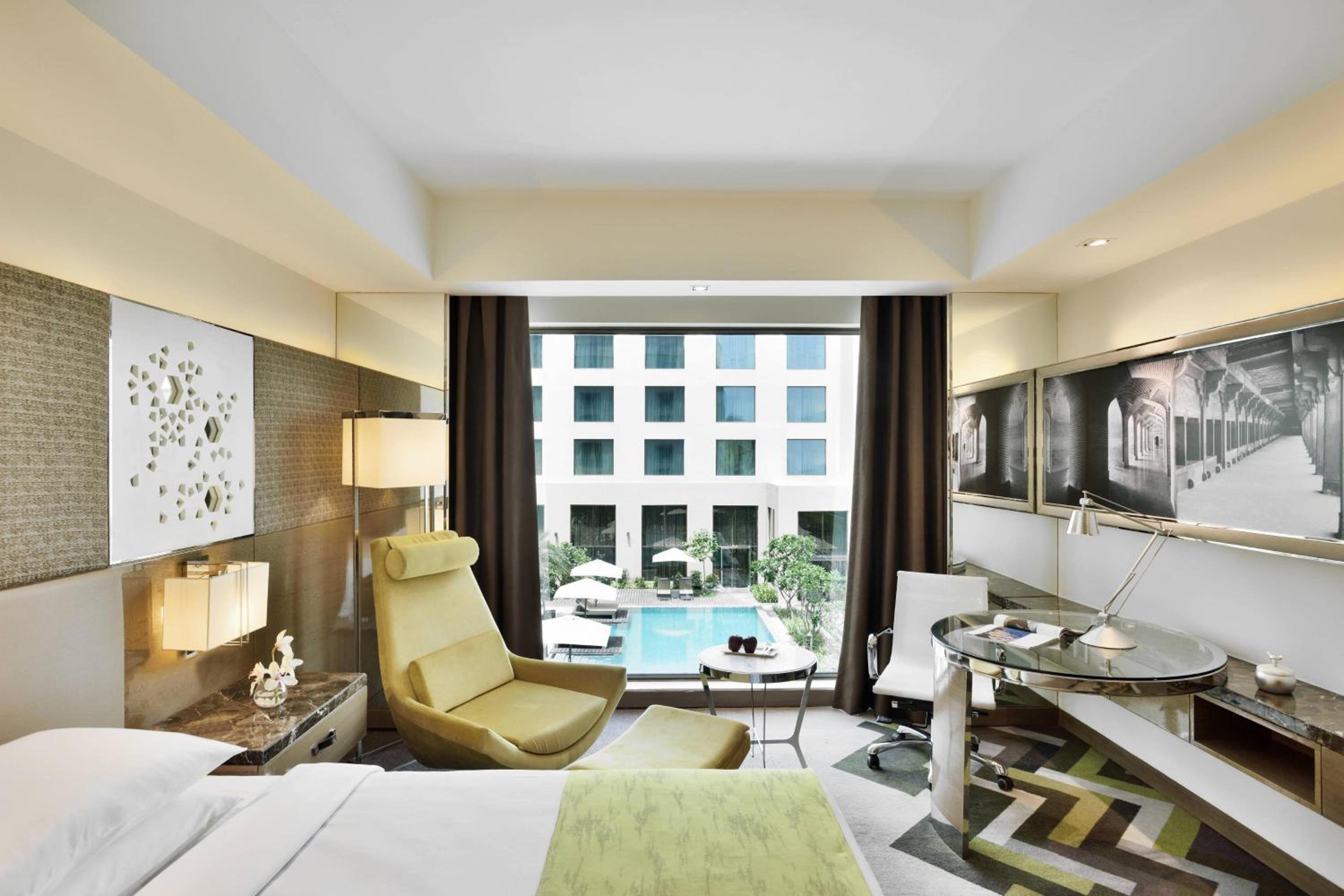 King Room with Pool View and INR 500 F&B credit, 1+1 Happy Hours (selected brands) and 15% discount on Spa