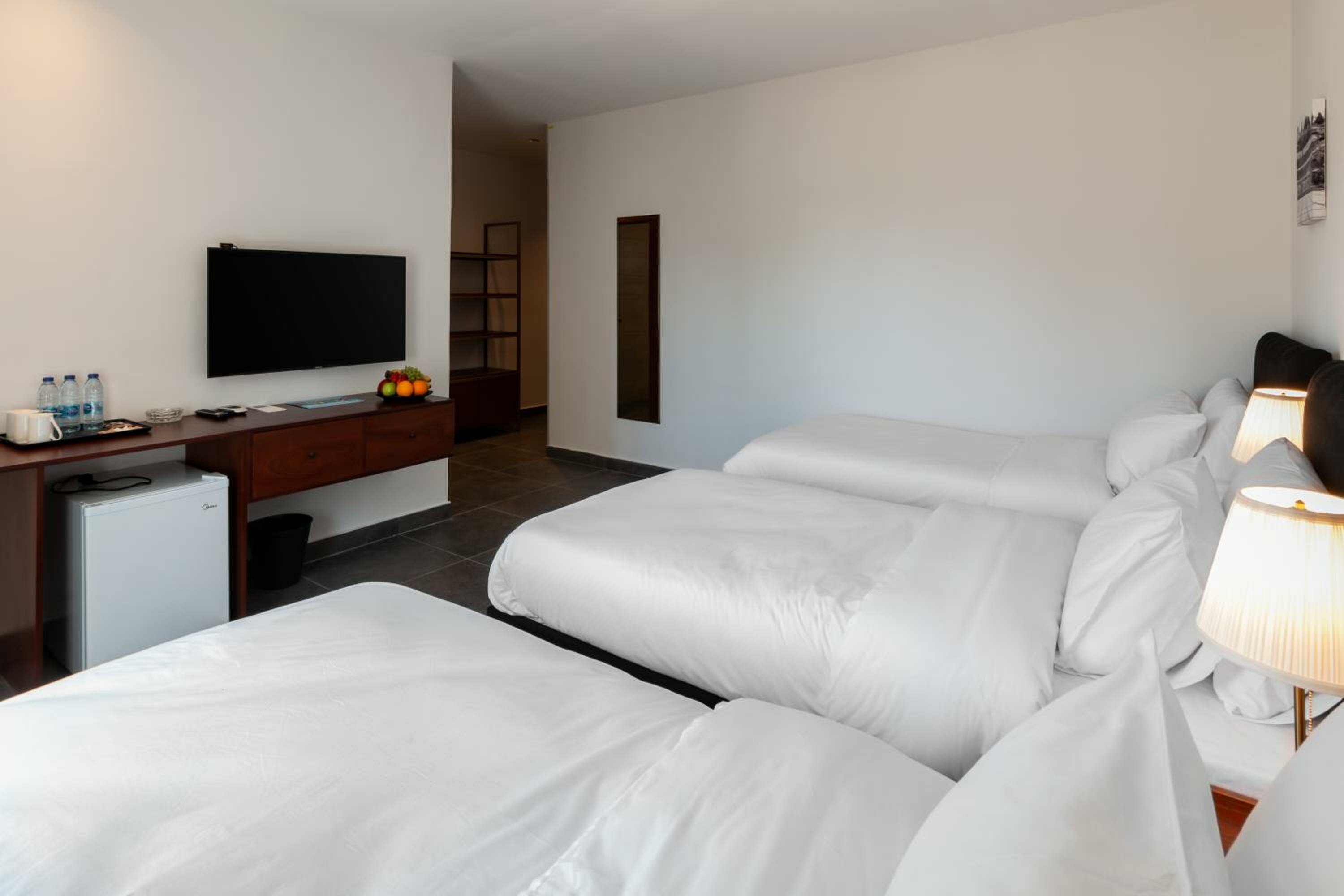 Deluxe Triple Room