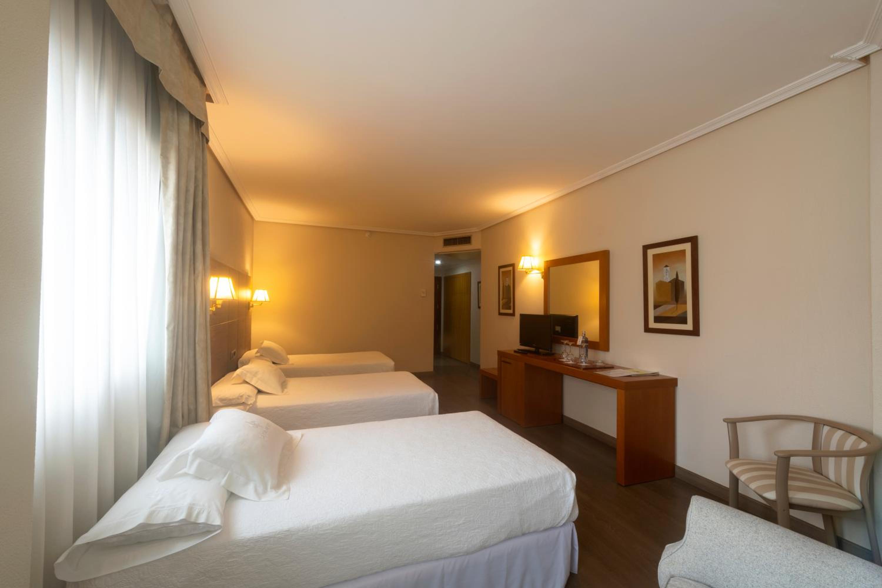 Double Room with Extra Bed (2 Adults + 1 Child)