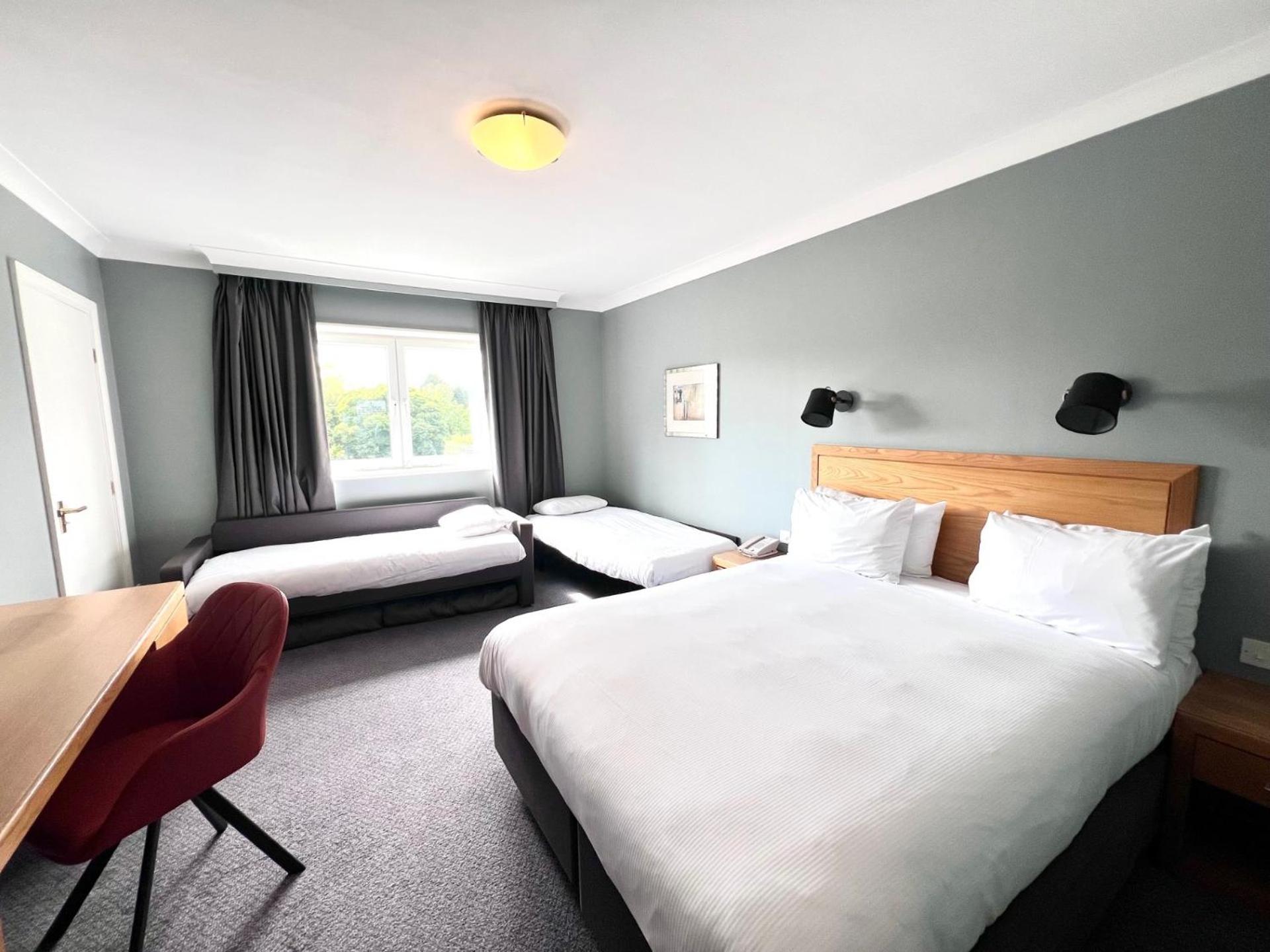 Standard Double Room with Double Bed and Two Single Sofa Beds