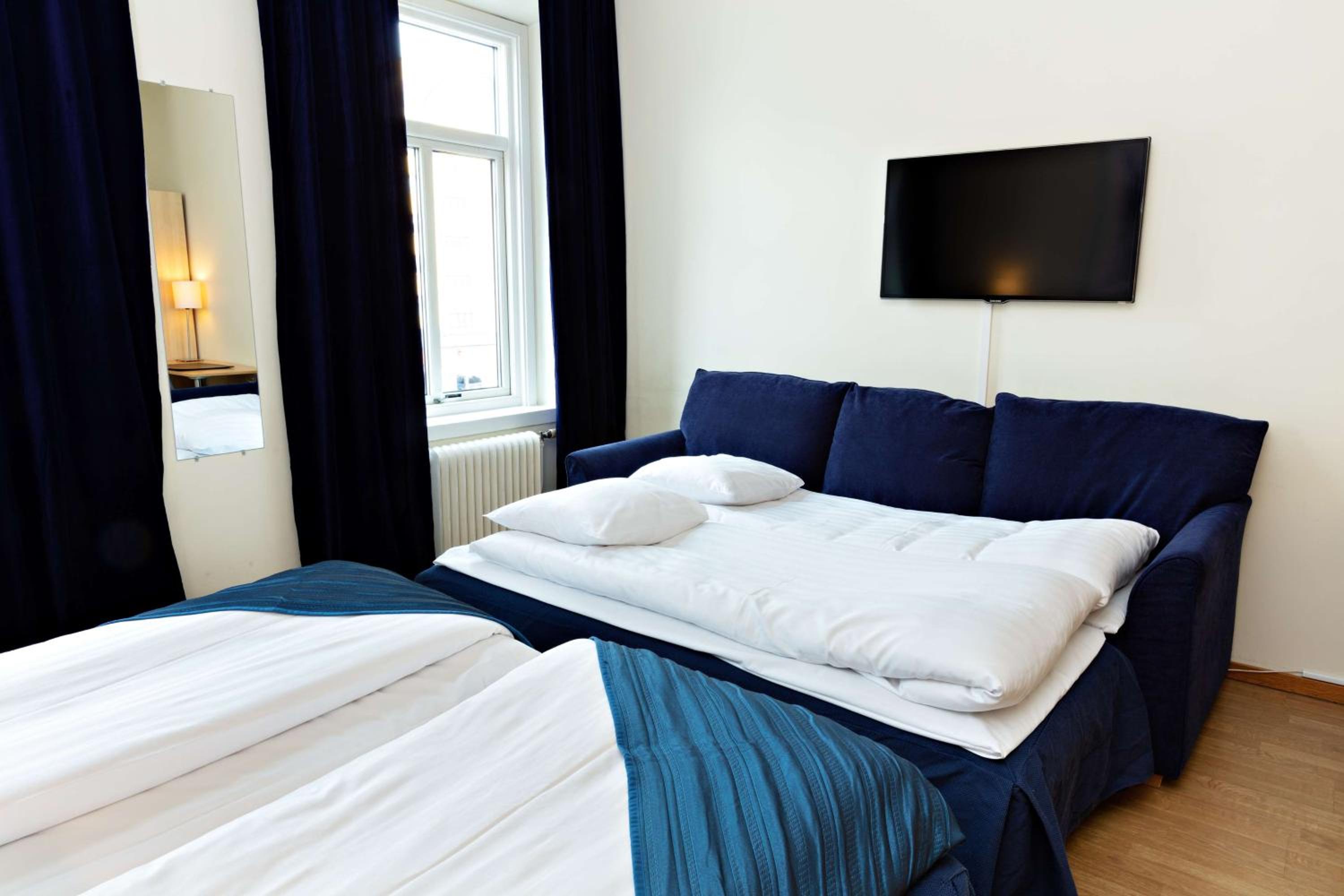 Family Room with Two Single Beds and Sofa Bed - Non-Smoking