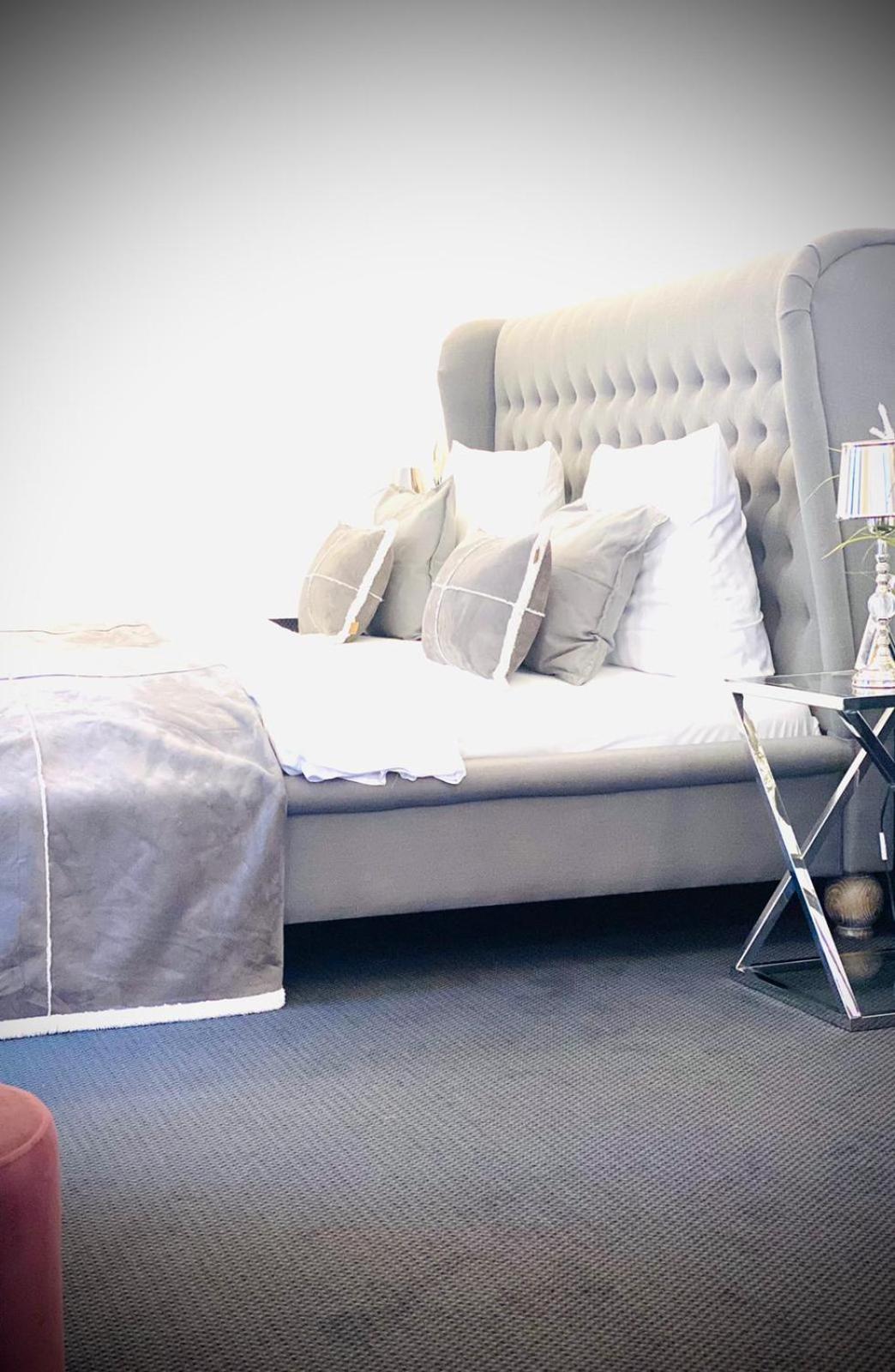 Deluxe quadruple room with roll-top Bath and Balcony