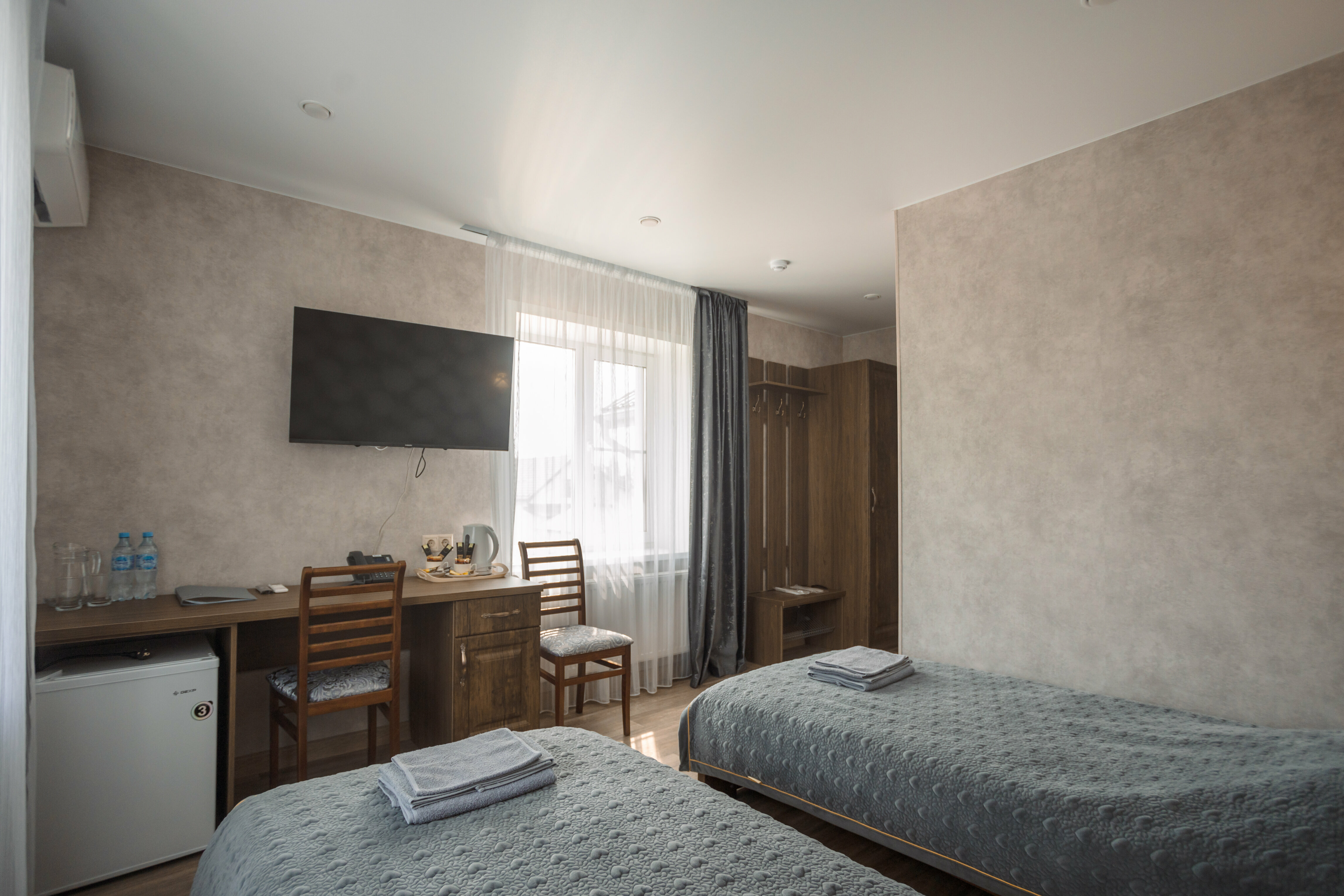 Двухместный номер с 2 отдельными кроватями и душем