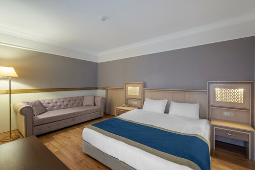 Junior Suite (3 Adults) в Utopia World