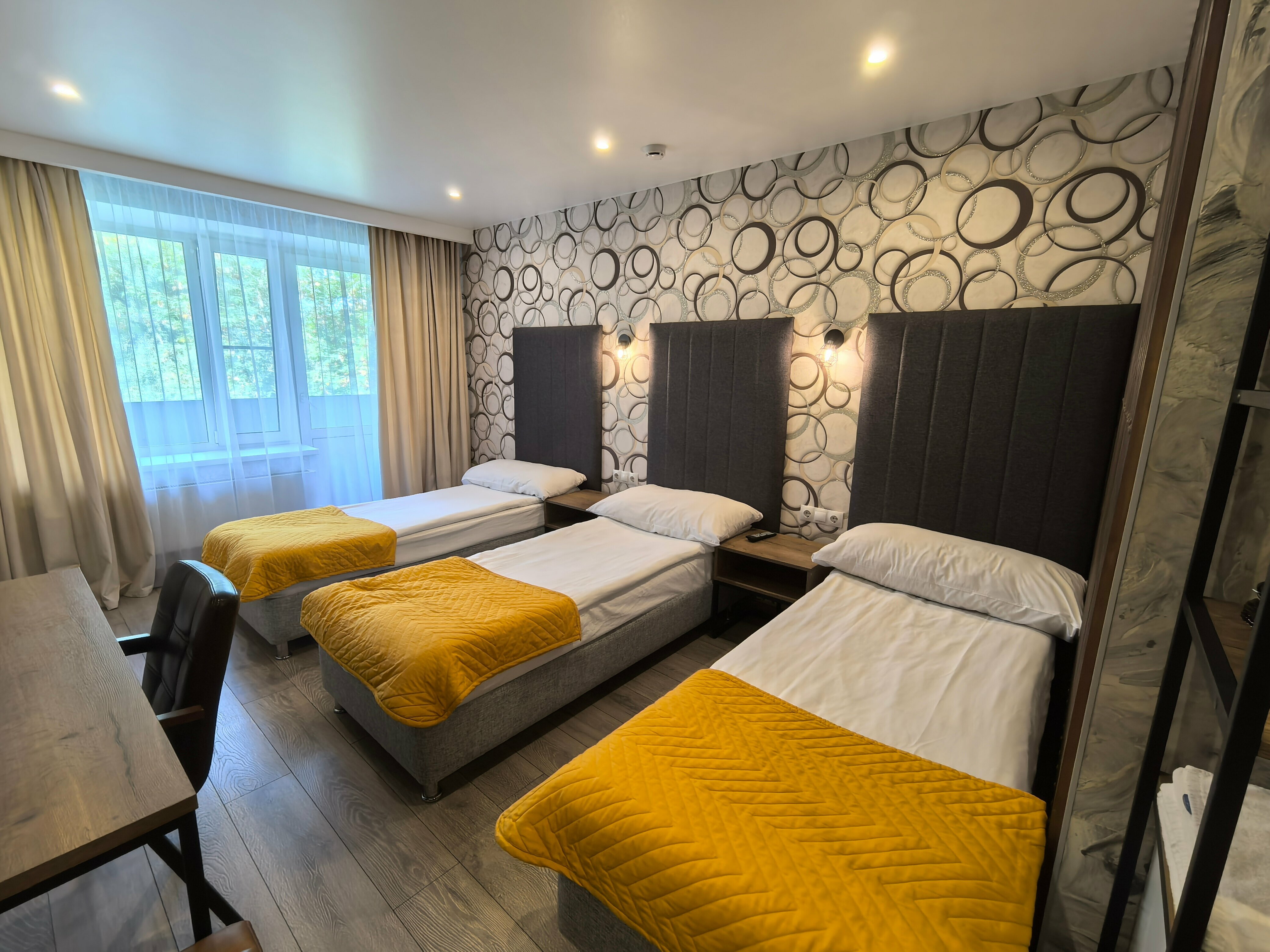 Улучшенный трехместный номер