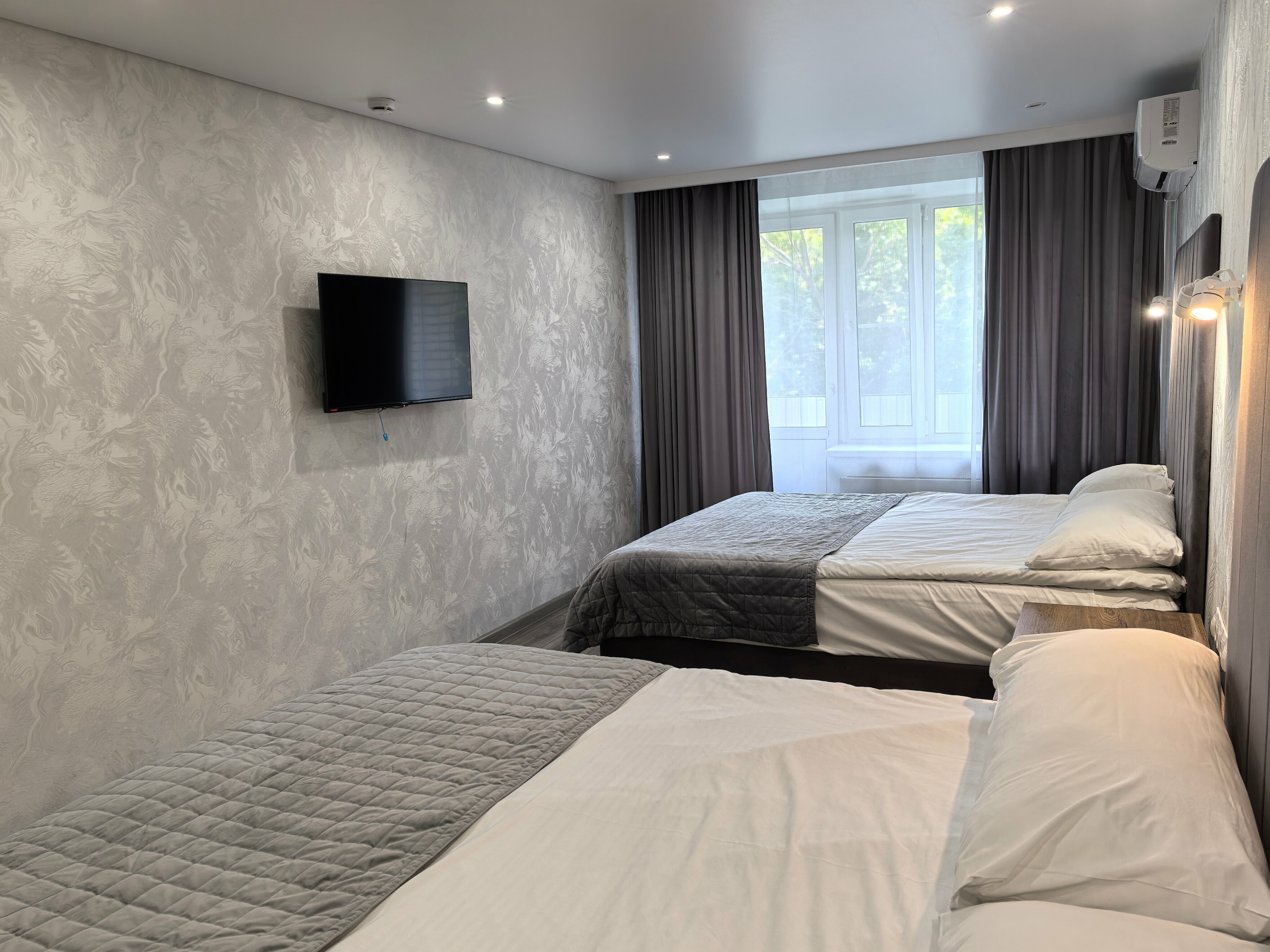 Четырехместный номер Делюкс