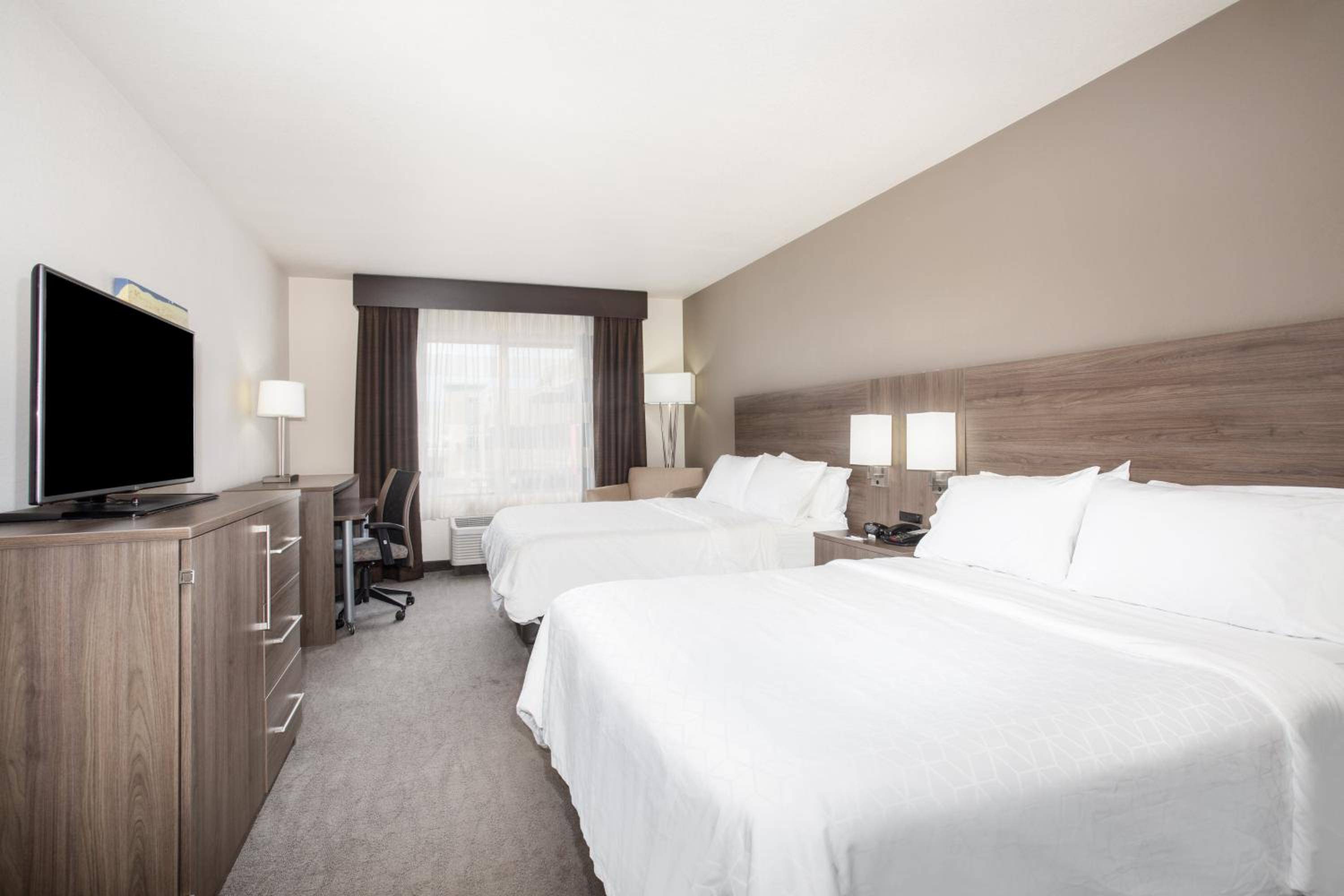 Queen Suite with Two Queen Beds and Sofa Bed