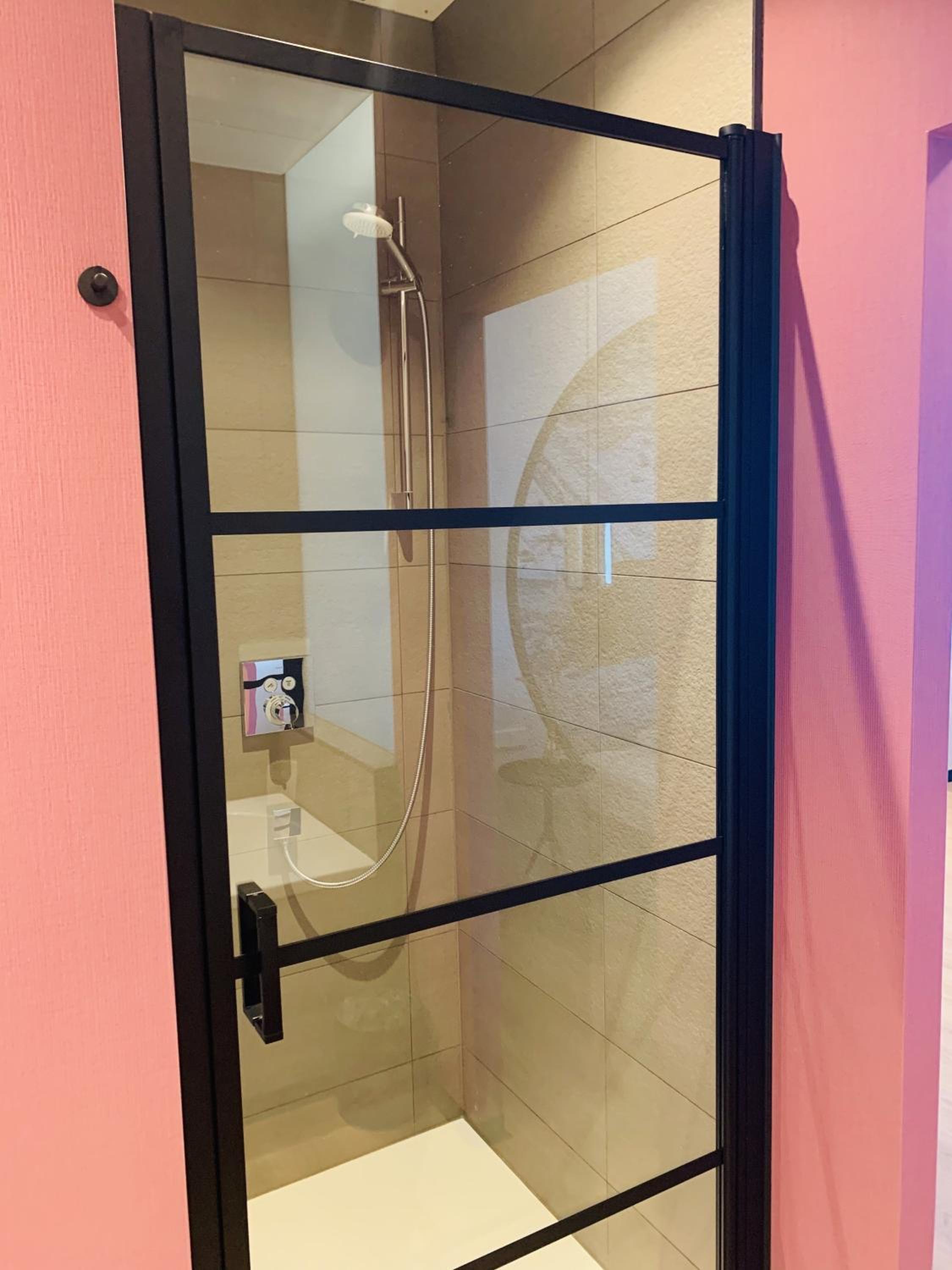 Large Room with Bathtub and Sloping Sea View