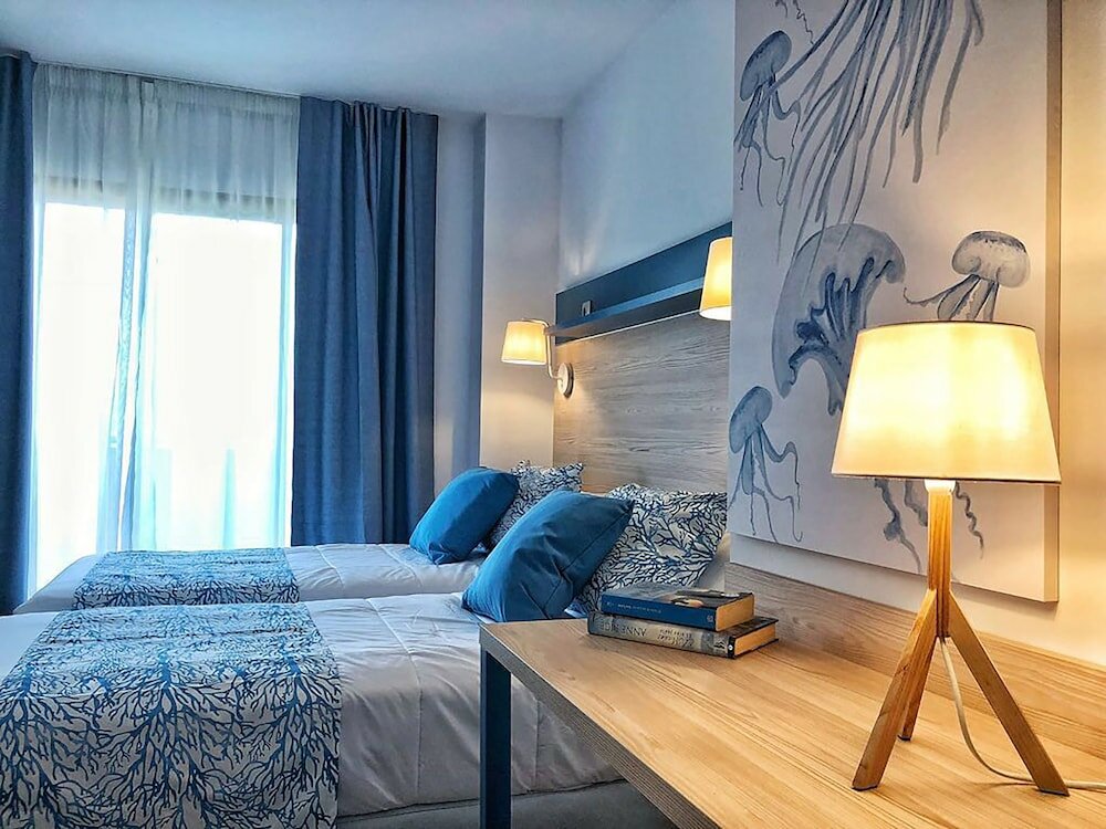 Family Quadruple Room, Balcony, City View