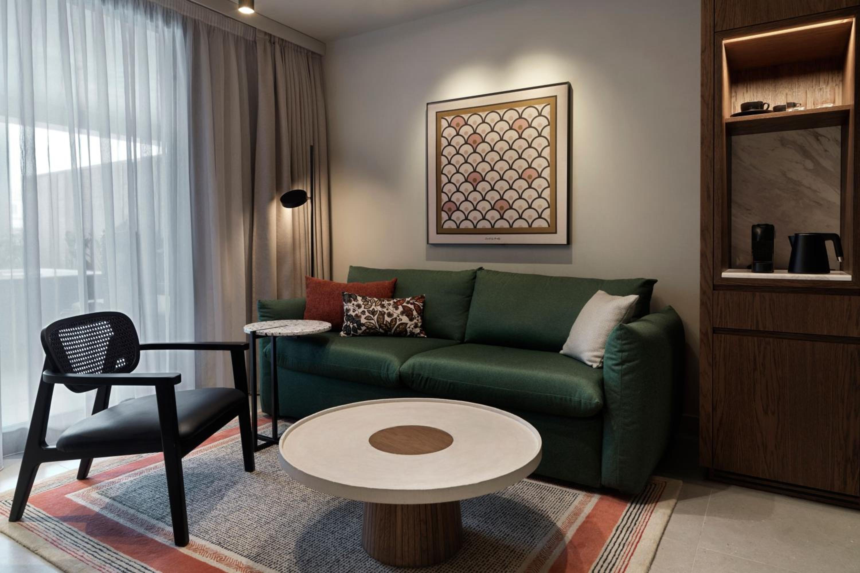 Junior Suite with Balcony and Garden View