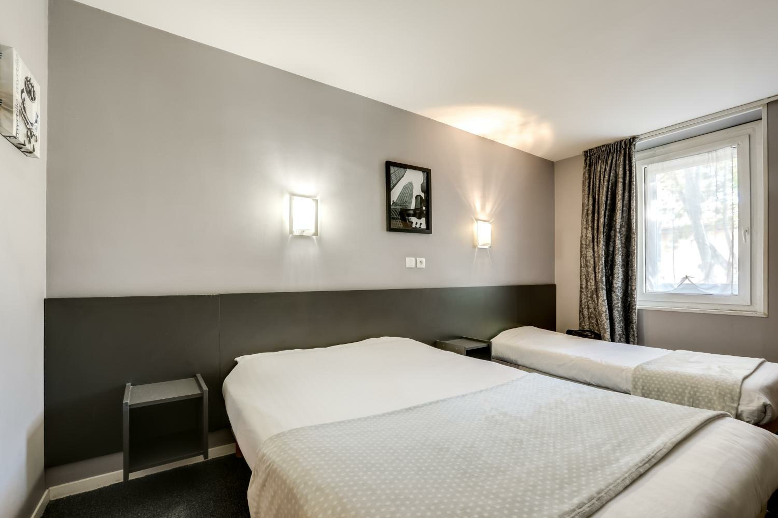 Triple Room (1 Double Bed + 1 Single Bed)