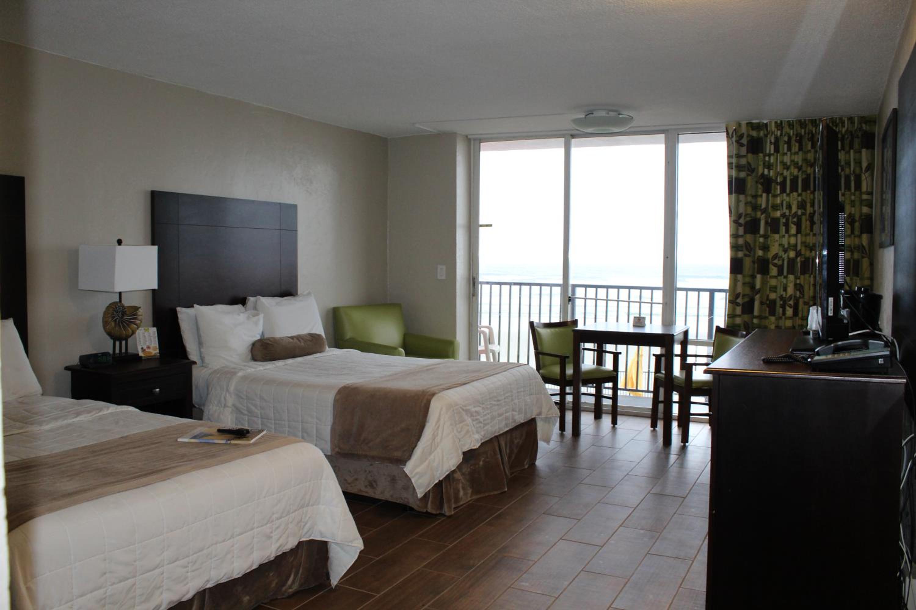 Ocean View Corner Balcony Two Double Beds