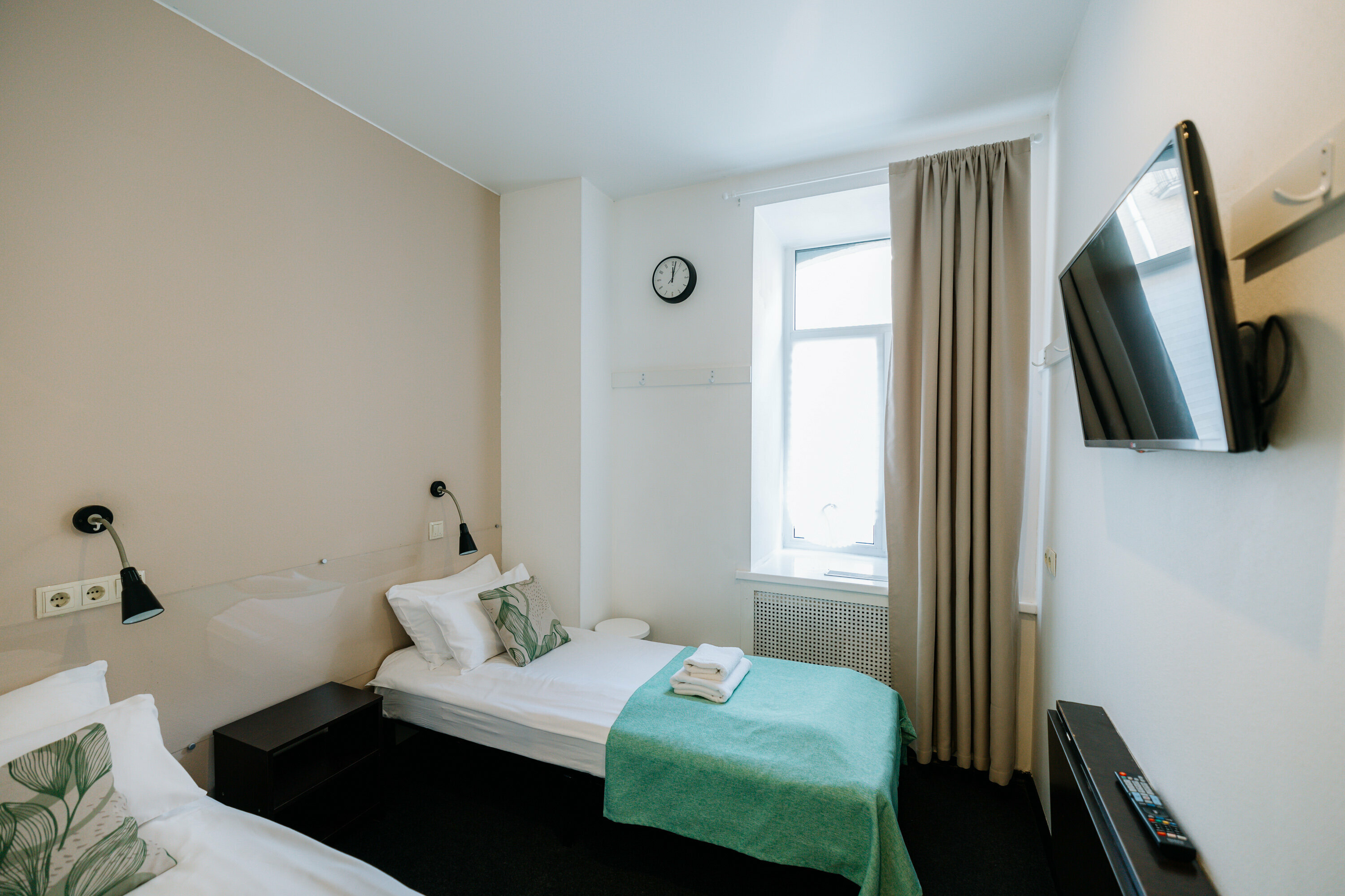 Стандартная двухместная комната с 1 большой или 2 раздельными кроватями