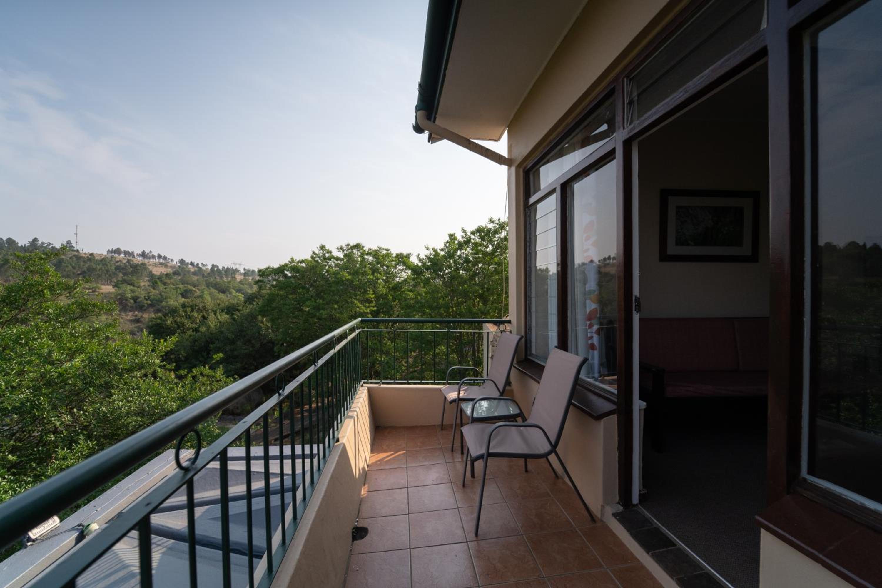 Mountain Facing Family Room with Balcony