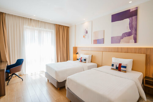 Номер "Стандарт" с двумя раздельными кроватями в Кортъярд Марриотт Сочи Красная Поляна