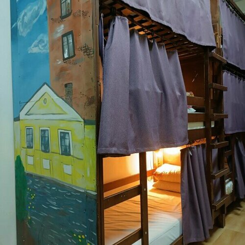 Общий номер для мужчин и женщин с 8 кроватями в Белый Хостел