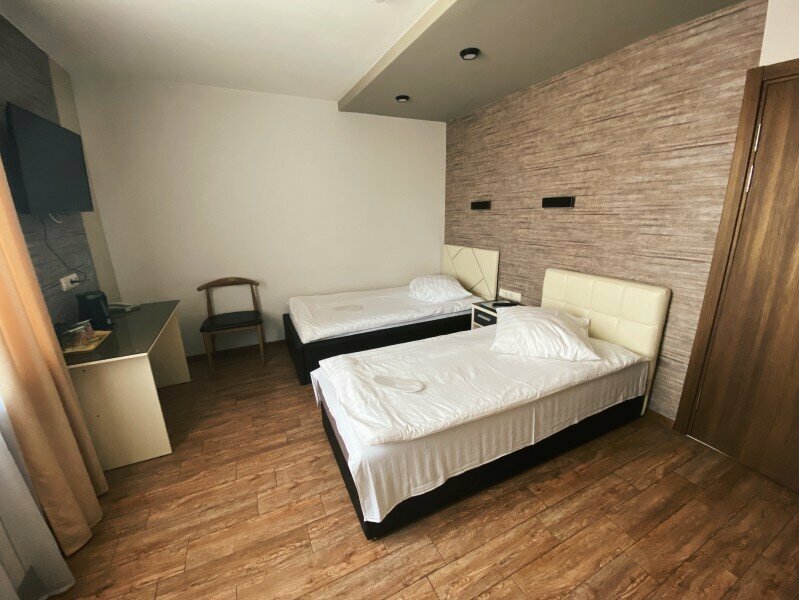 Улучшенный двухместный номер с 2 отдельными кроватями