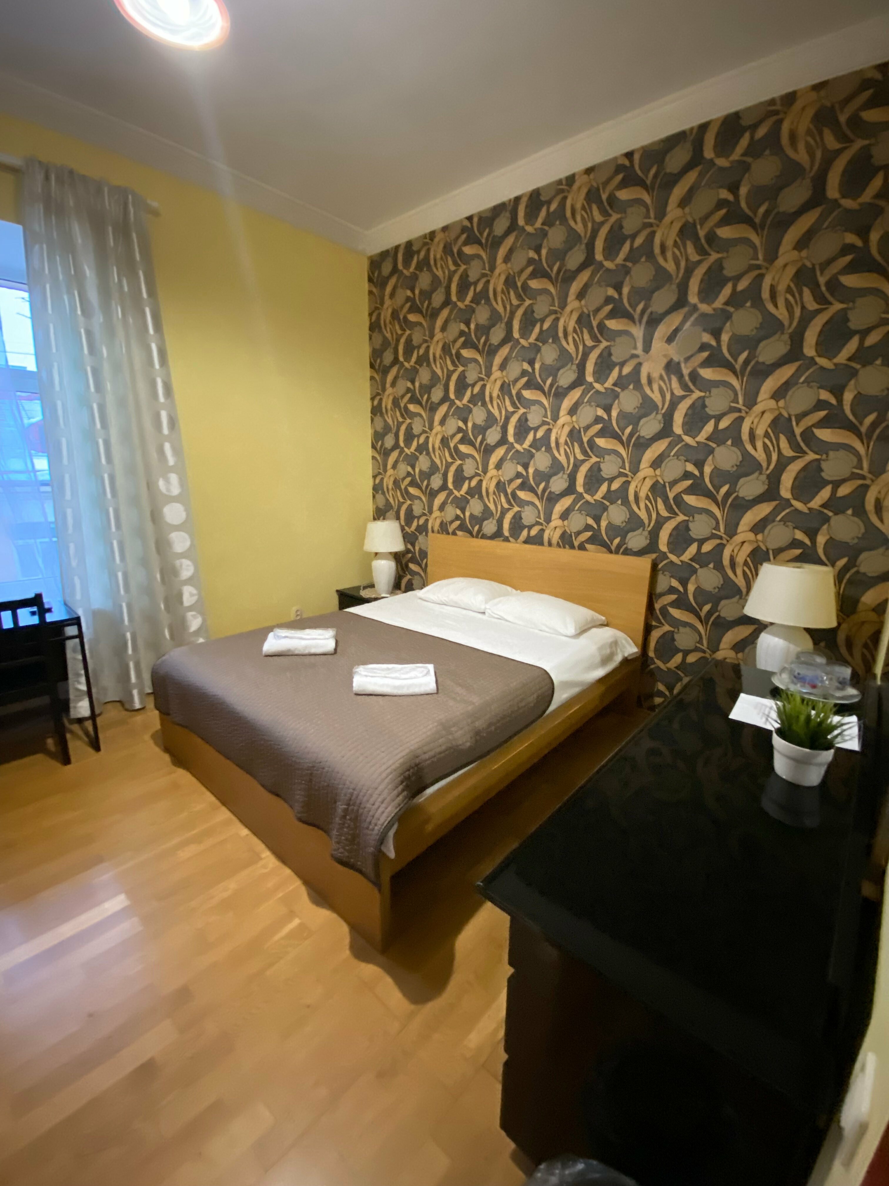 Трехместный номер с общей ванной комнатой