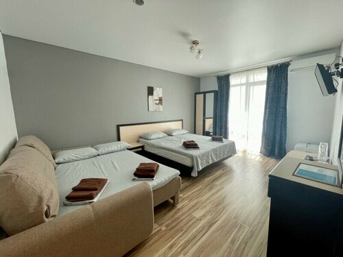 Улучшенный семейный номер в Джулия