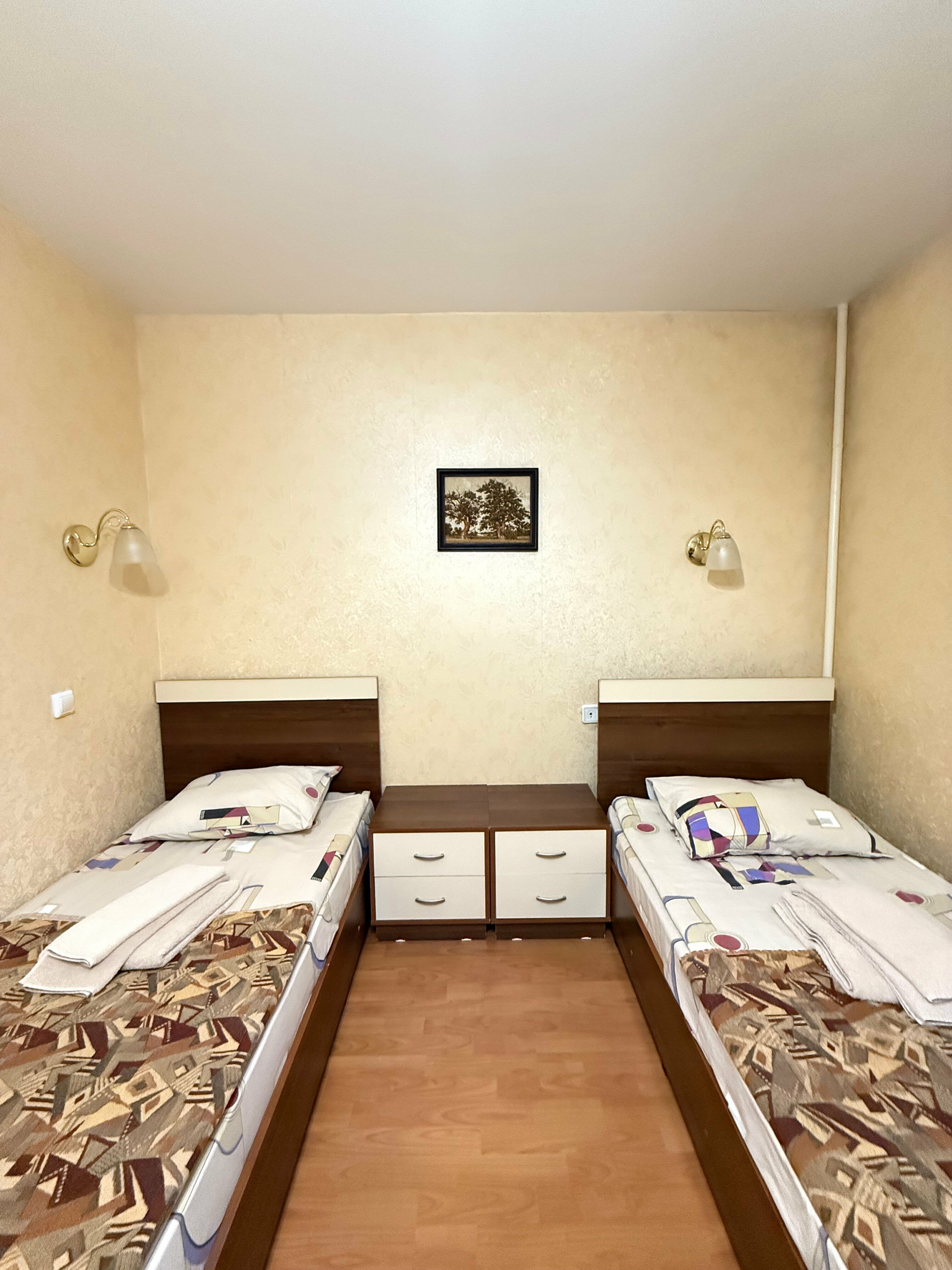 Просторный двухместный номер с 2 отдельными кроватями