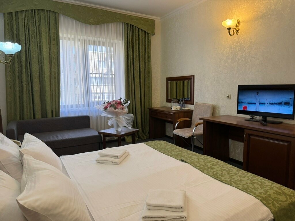 Улучшенный номер с кроватью размера «king-size» или 2 отдельными кроватями