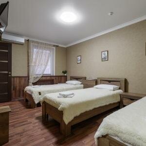 Трехместный стандартный с тремя односпальными кроватями