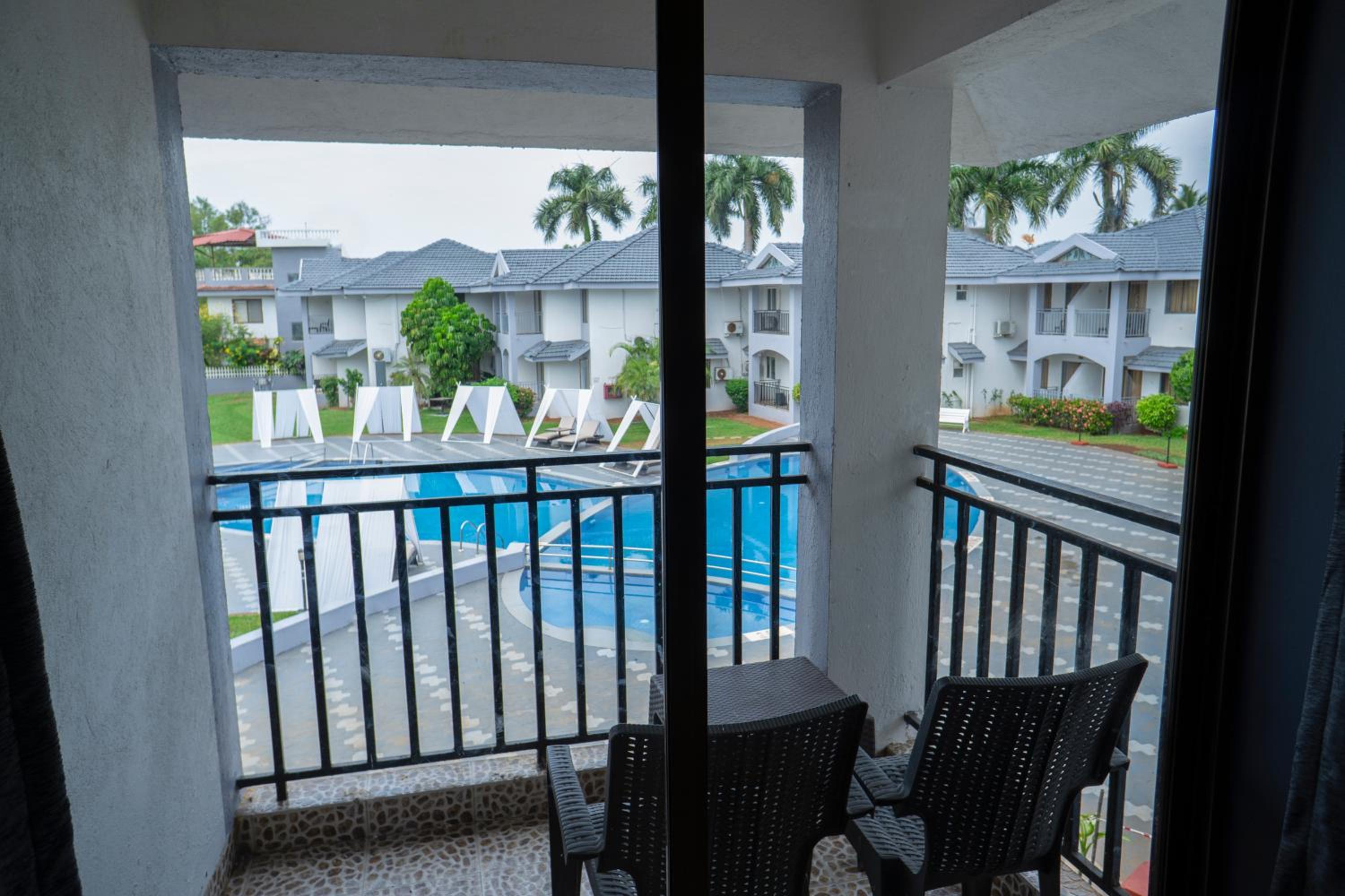 Luxury  Pool View Suite with living room & balcony	