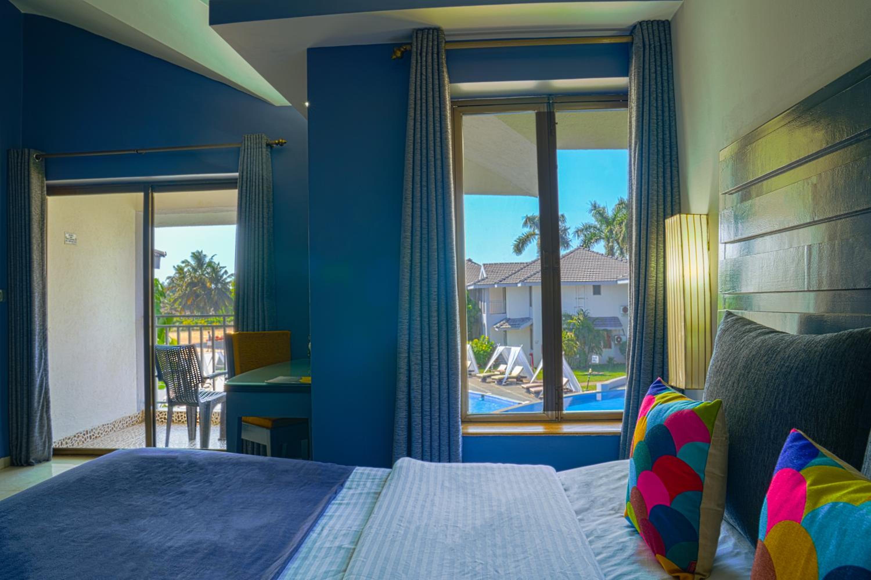 Luxury  Pool View Suite with living room & balcony	