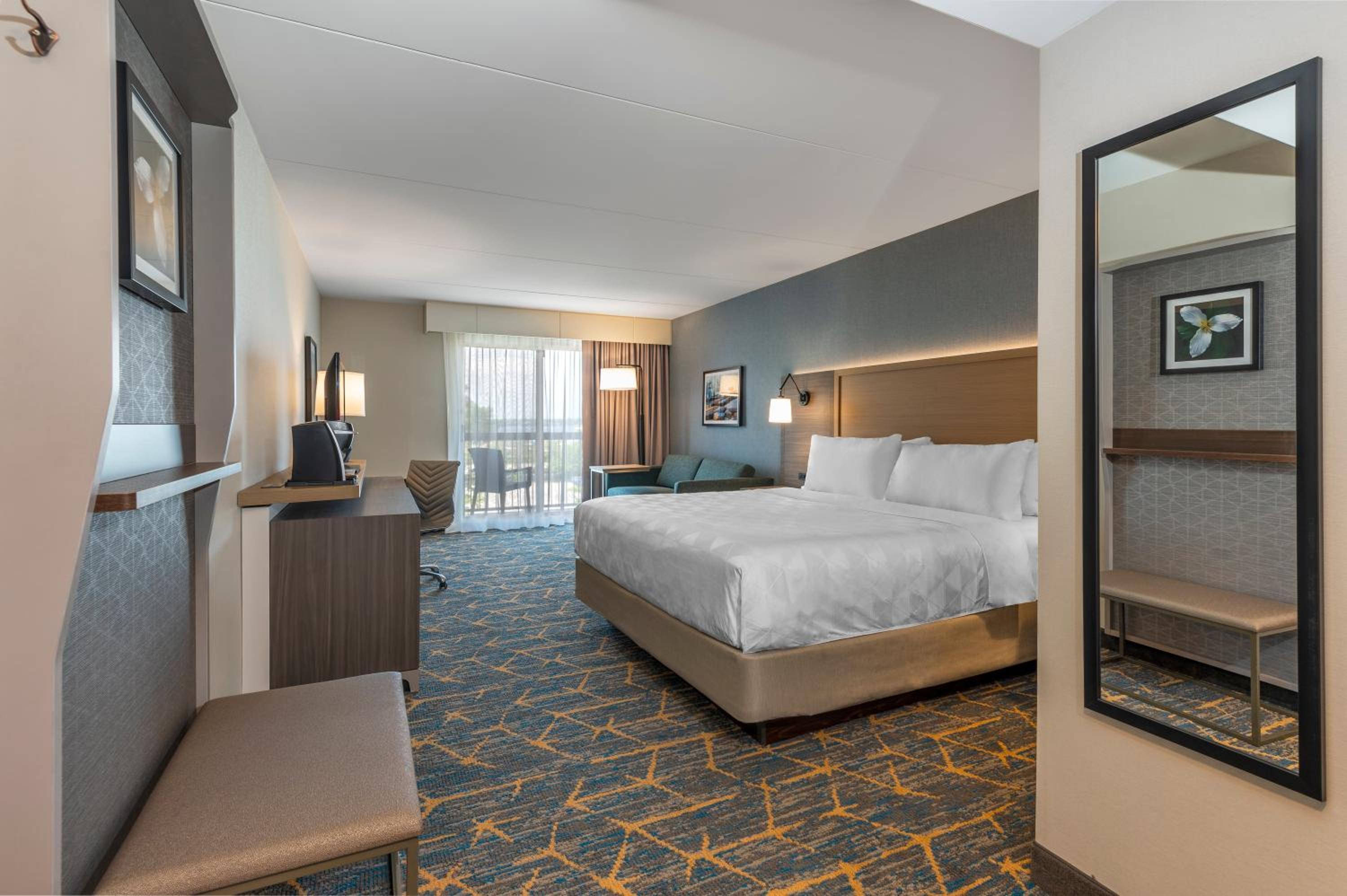 Standard King Room with Sofa Bed and Balcony - Partial City View