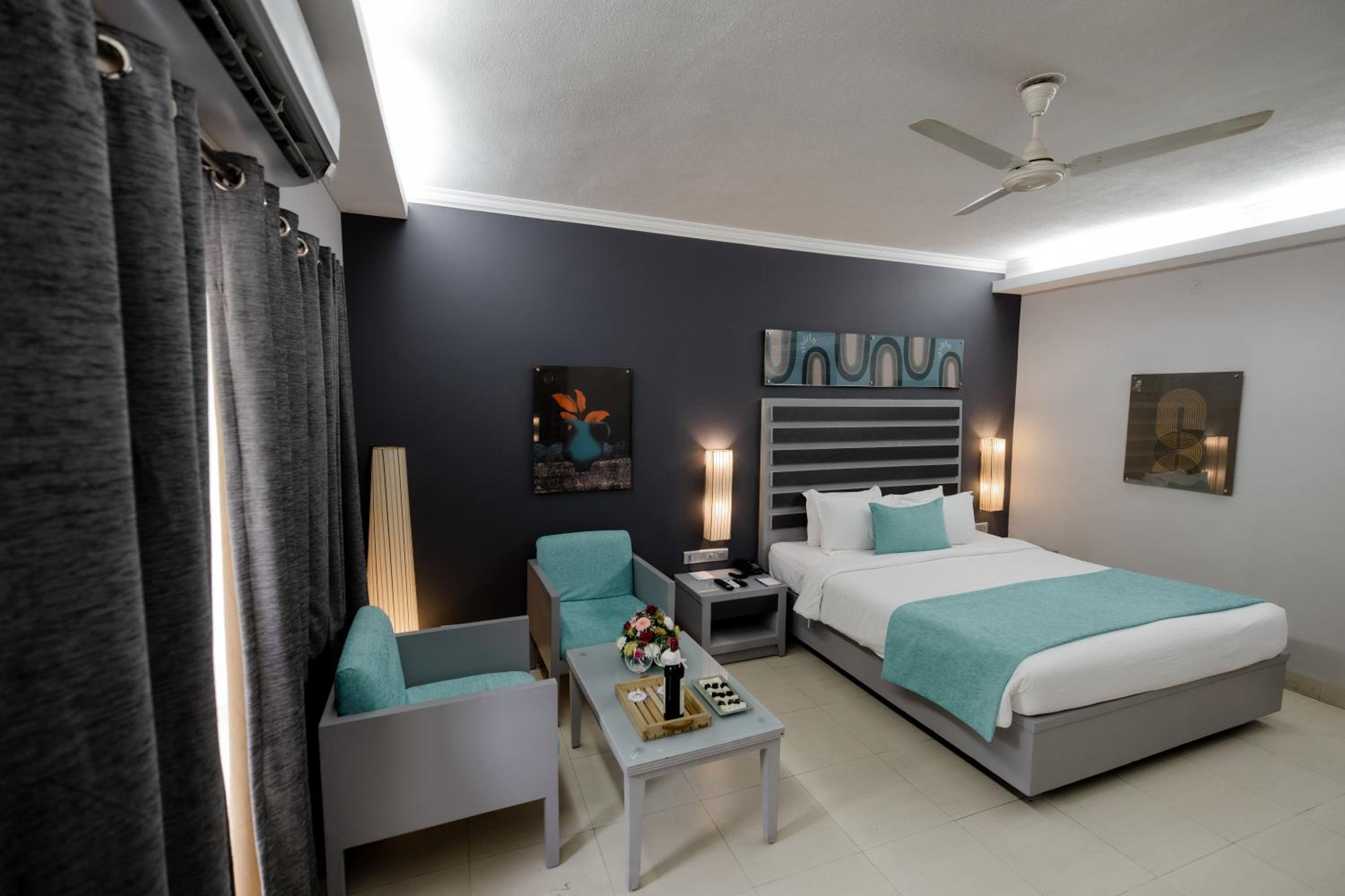 Deluxe pool view room with balcony	