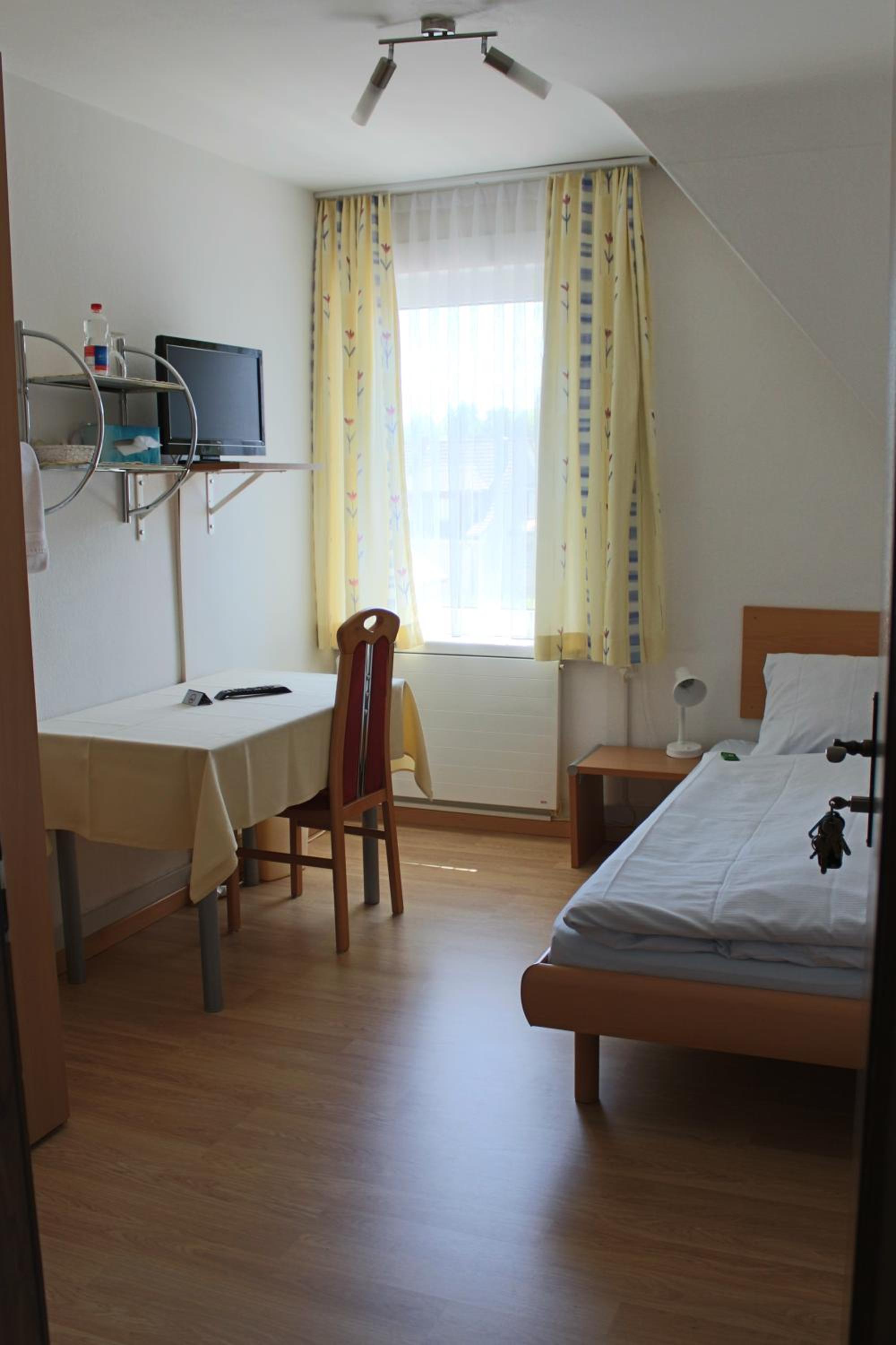 Single Room with Shared Bathroom