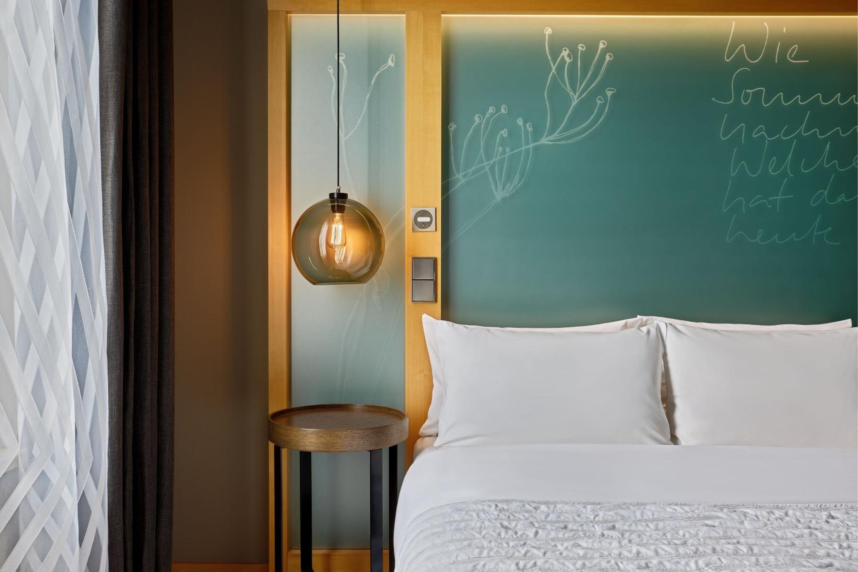 Superior Guest Room with Sofa Bed and Courtyard View