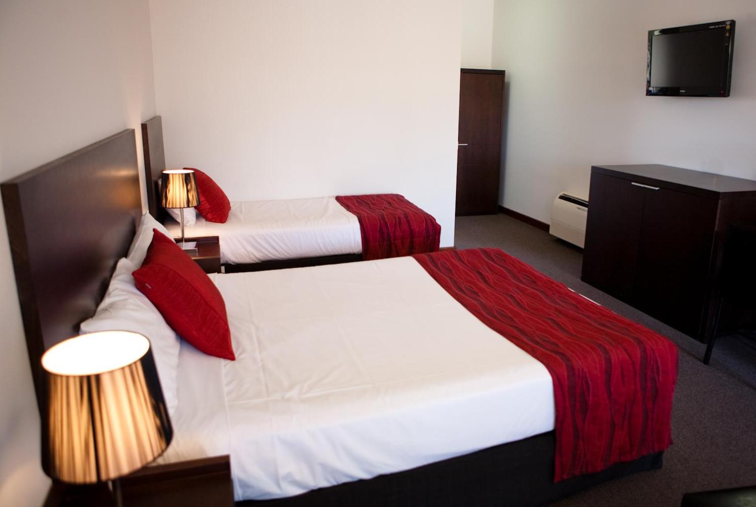 Superior Room with One Queen Bed and Two Single Beds