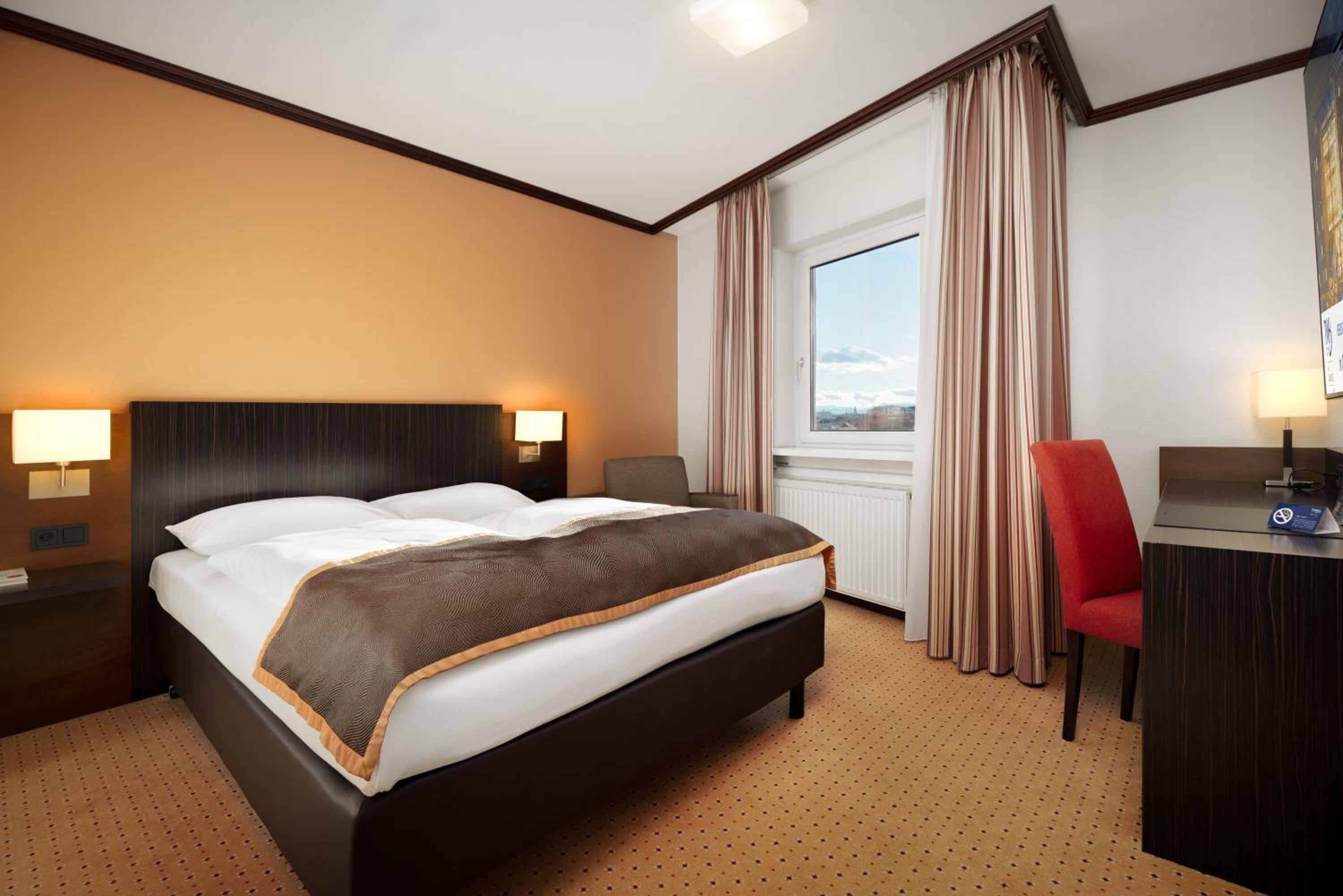 Comfort room with queen-size bed