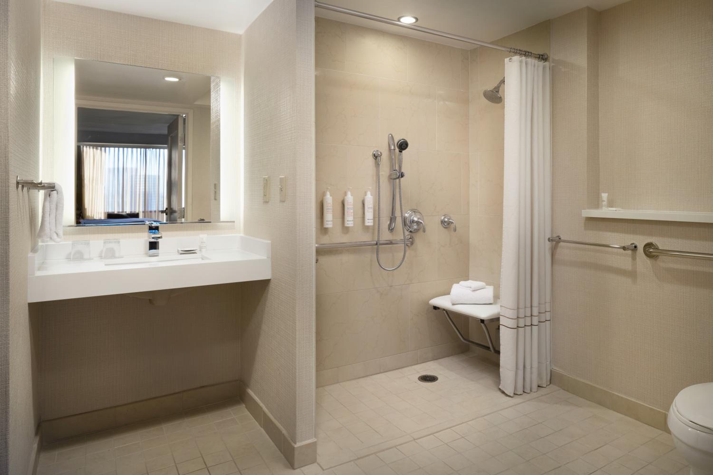 Junior Double Suite with Sofa Bed - Mobility/Hearing Accessible with Roll-In Shower