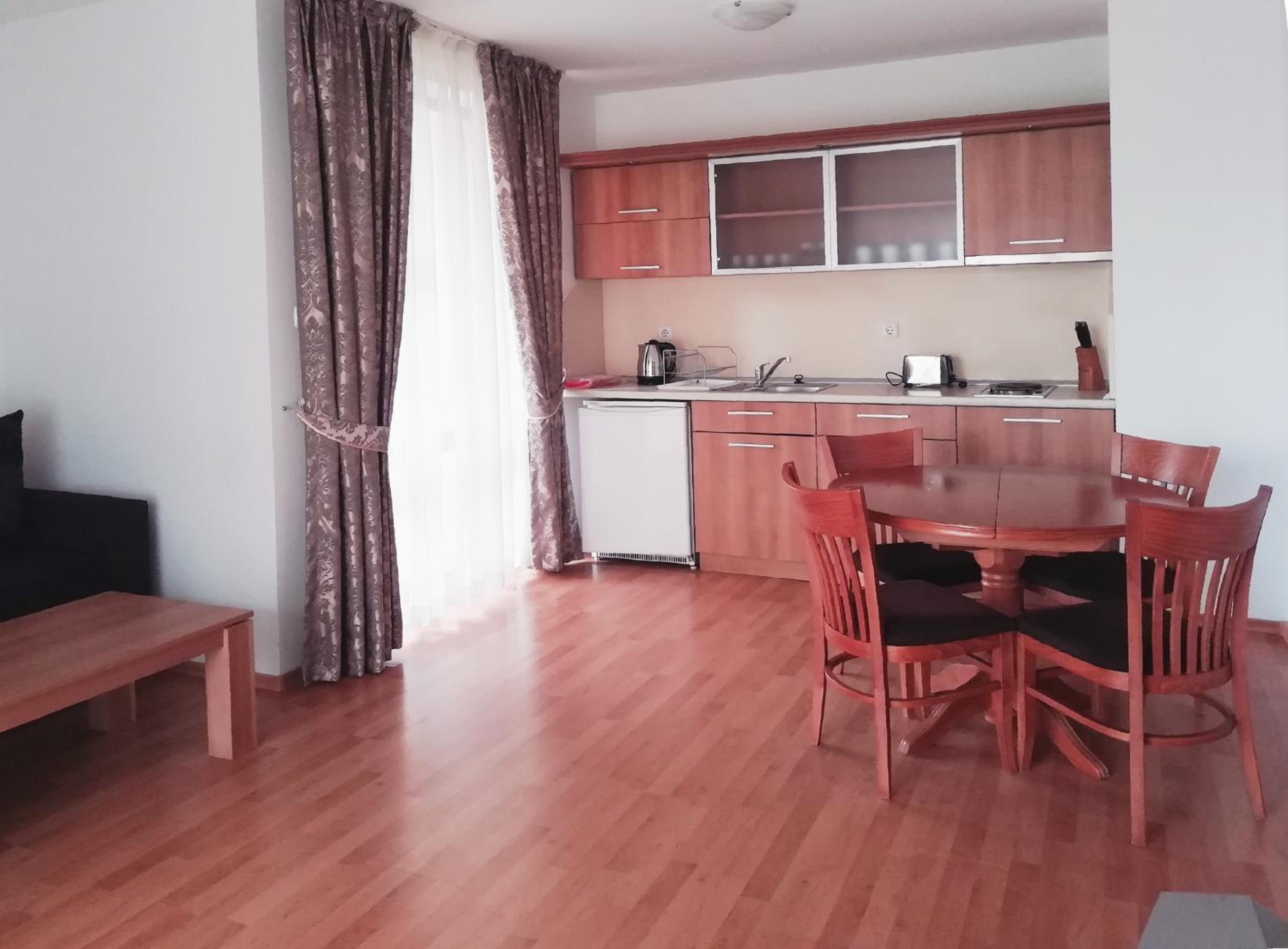 One-Bedroom Apartment with Balcony (2 Adults + 2 Children)