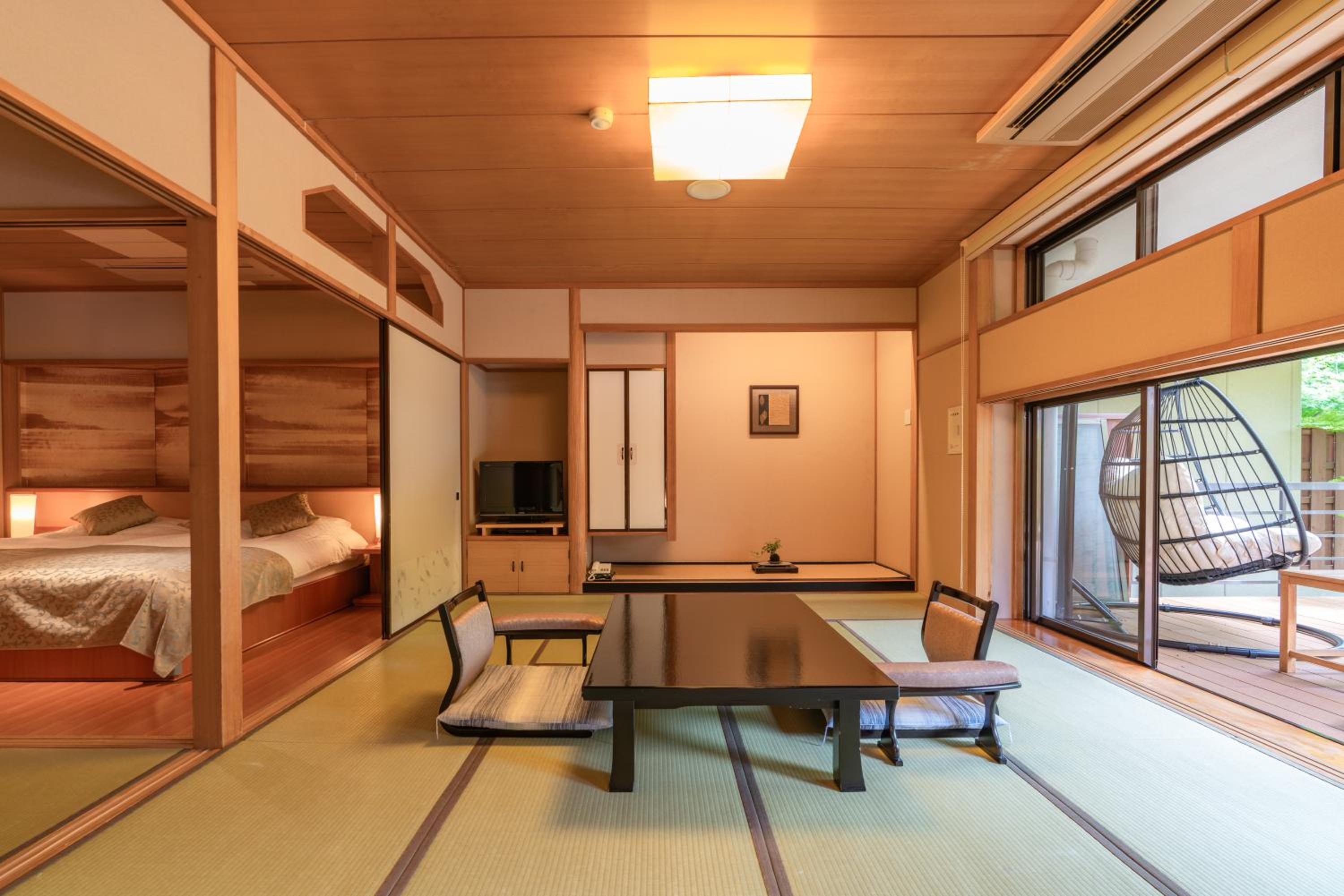 Renovated - Room with Tatami Area with Foot Bath - Garden view